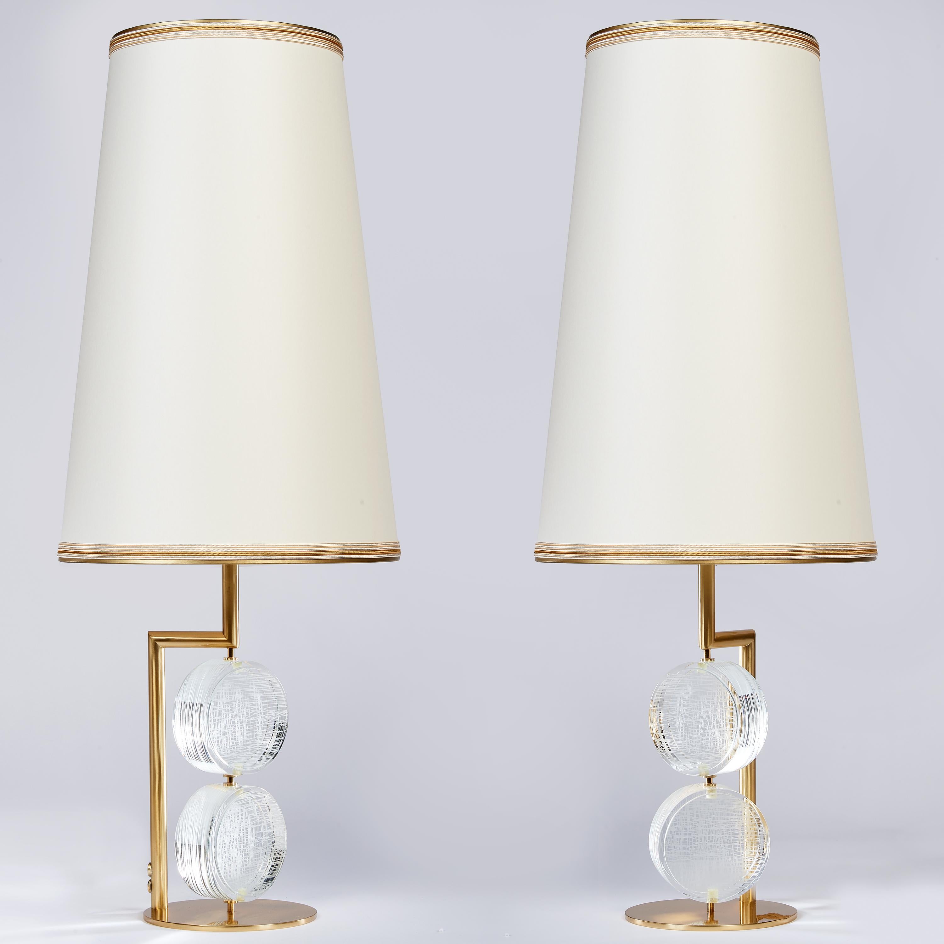 Roberto Rida (b.1943)
A kinetic pair of elongated table lamps
Massive movable etched glass disks; bronze mounts.
Signed, Italy 2021
Limited edition exclusive to L'Art de Vivre
Measures: 12 Diameter x 30 Height
Wired for the US with one