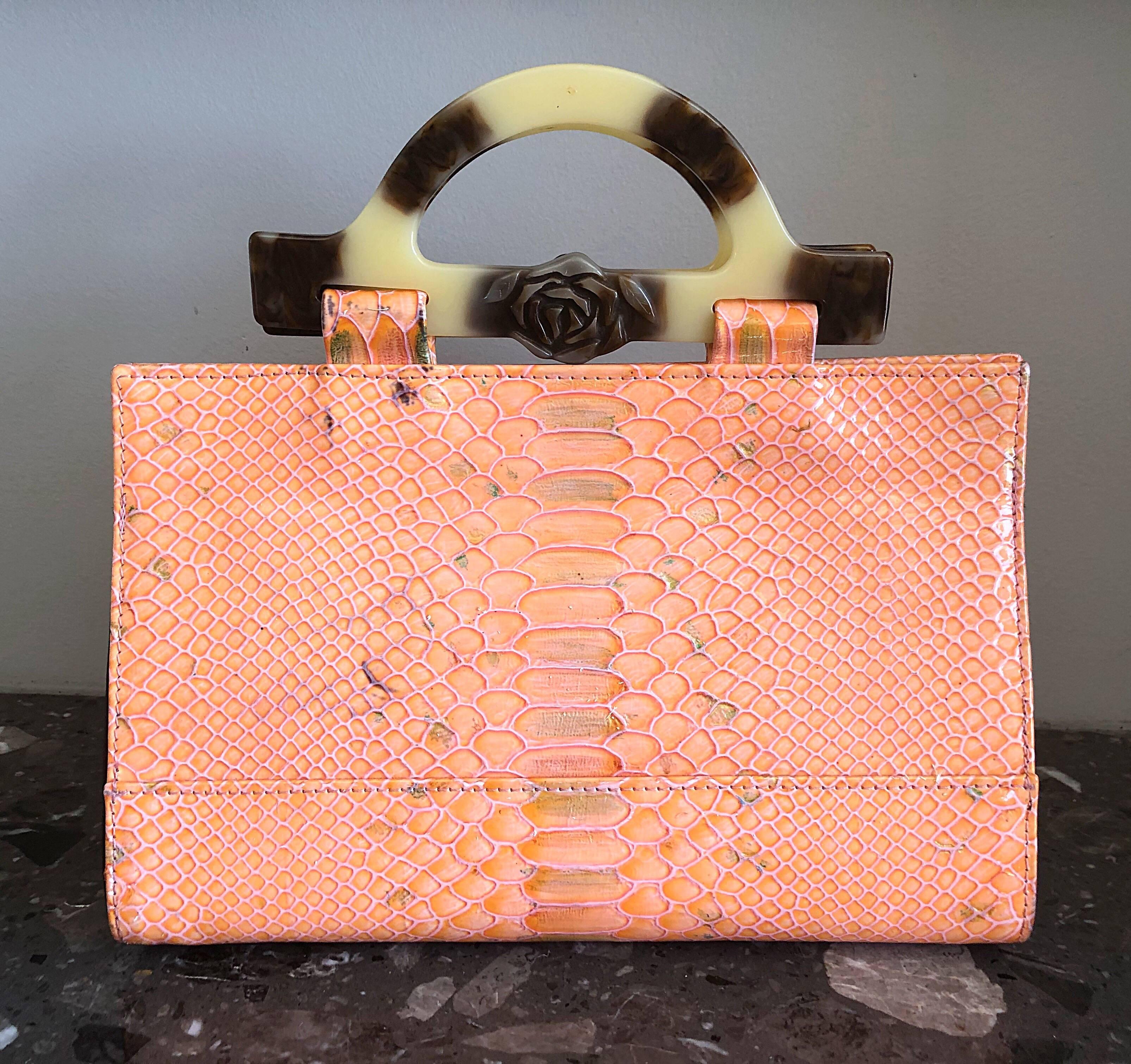 One-of-a-kind ROBERTO VASCON vintage 90s pink python snake skin satchel bag! Roberto Vascon bags were hugely sought after in the 1990s, and production often could not keep up with demand. Nearly all of the designer's pieces were uniquely
