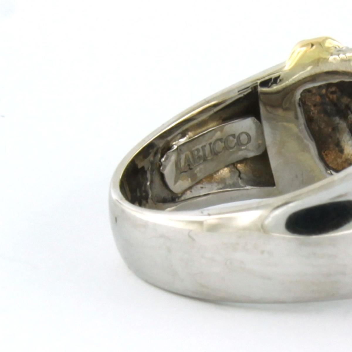 Roberto Coin Nabucco - 18 kt bicolor gold ring set with brilliant cut diamond to. 1.00 ct - F/G - VS/SI - ring size U.S. 8 - EU 18(57)

detailed description:

the top of the ring is 1.2 cm wide

weight 11.8 grams

ring size U.S. 8 - EU 18(57), ring