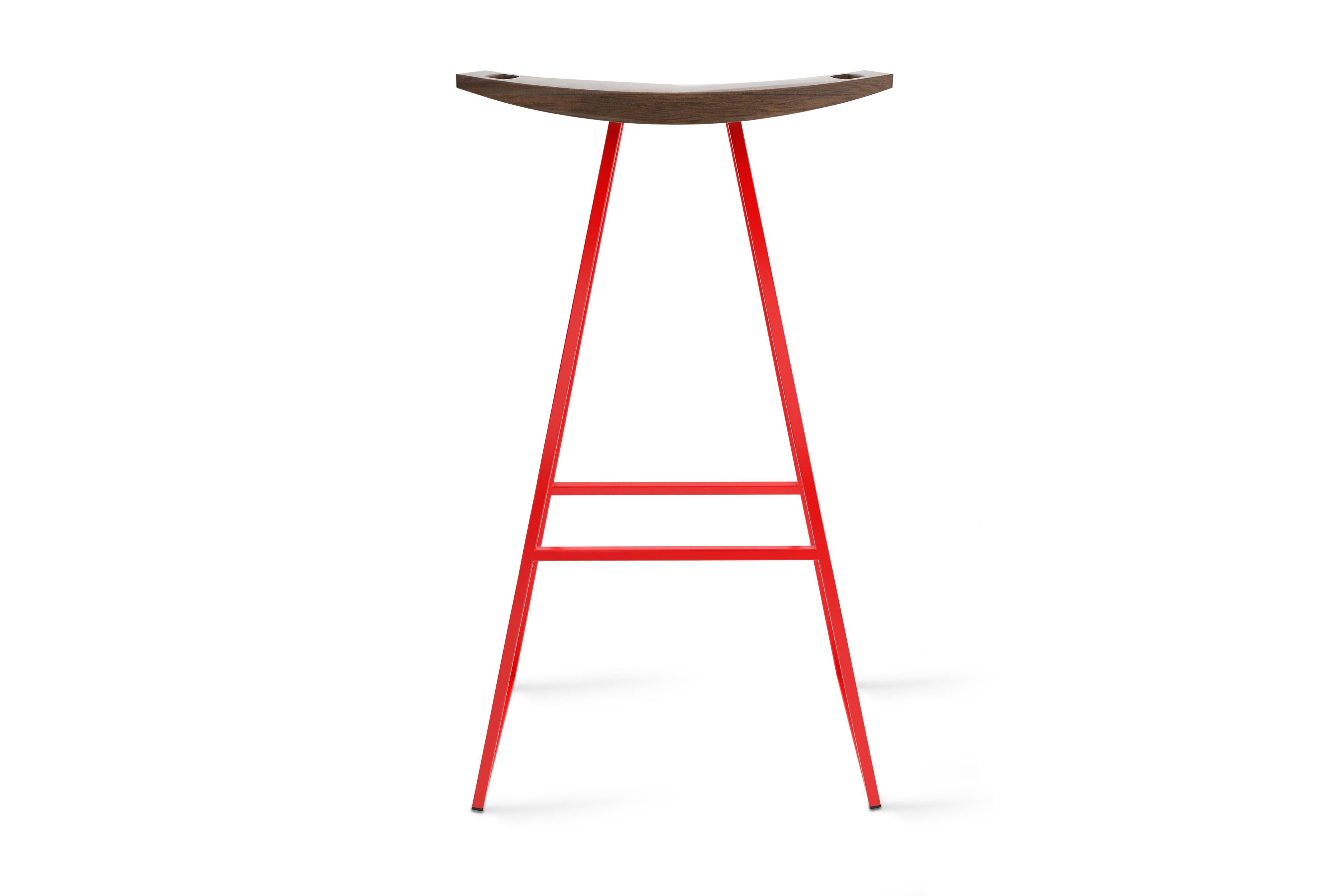 This sleek stool has a thin carved wooden seat that rests on a steel tubing base. The elegant seat is curved for seamless comfort while displaying a stunning intersecting diagonal accent inlay. This eye-catching and durable piece will make any