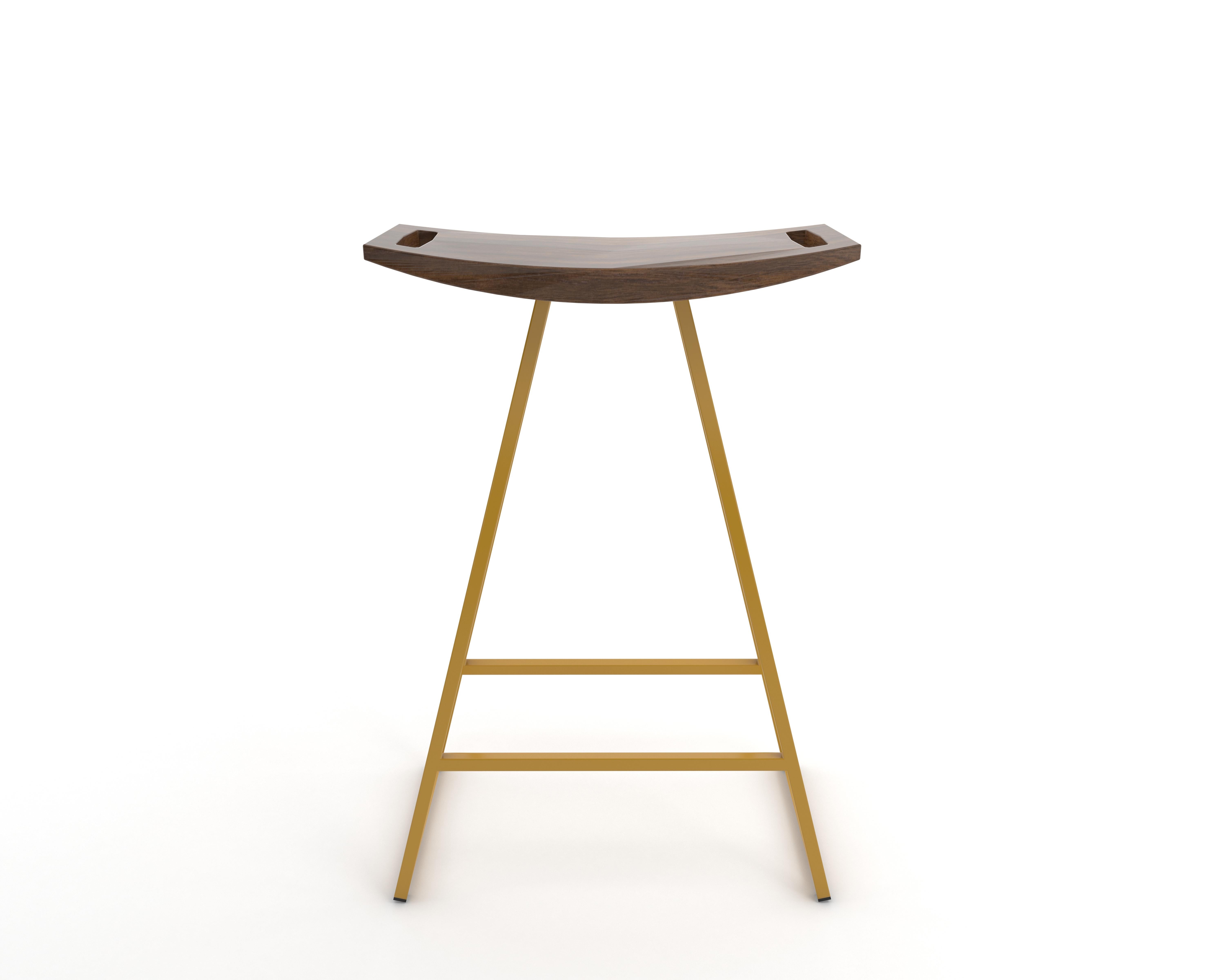 This sleek stool has a thin carved wooden seat that rests on a steel tubing base. The elegant seat is curved for seamless comfort while displaying a stunning intersecting diagonal accent inlay. This eye-catching and durable piece will make any
