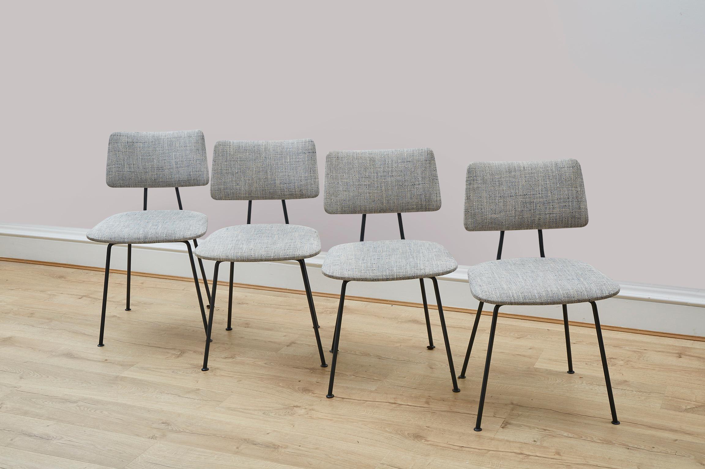 A fantastic rare set of 4 dining chairs from Robin day for Hile 1950's These chairs originally designed for the royal festival hall are simply stunning.

This set of 4 chairs has had full restoration.The steel frame has been colour matched and
