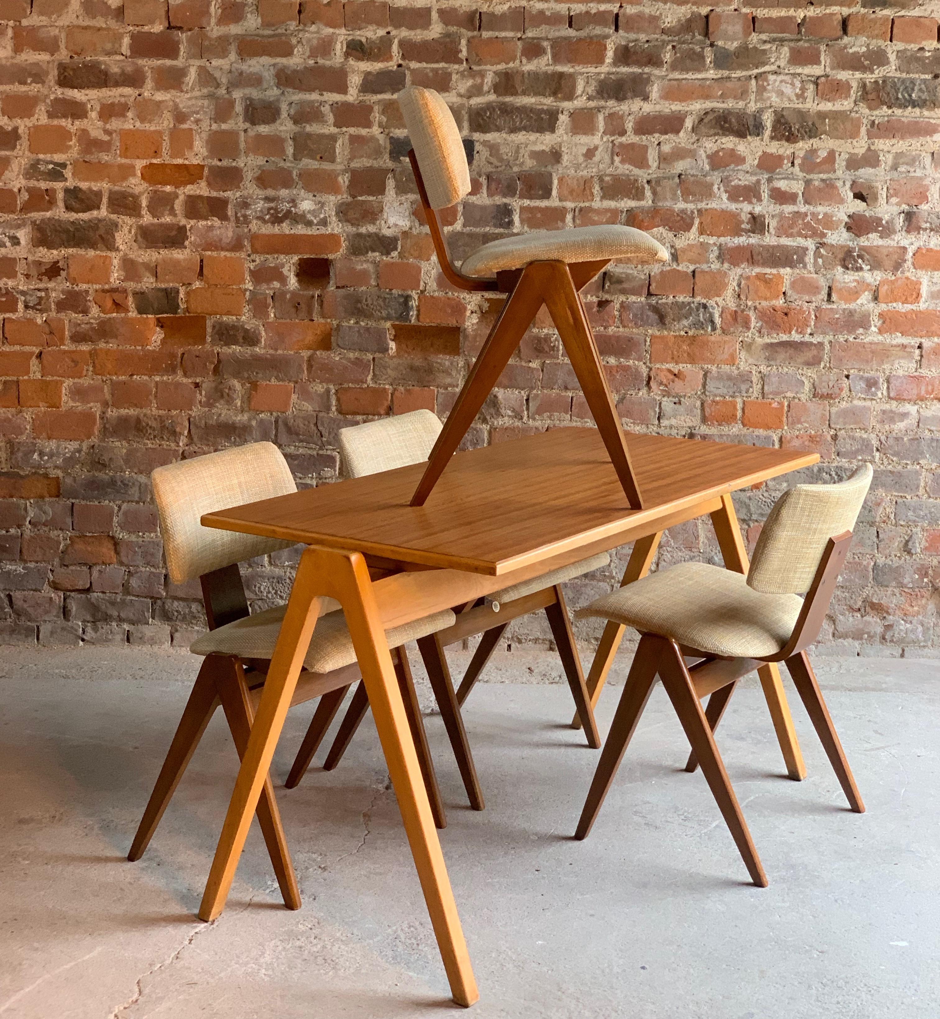 Robin Day Hillestak dining table and vhairs by Hille midcentury Design, circa 1950

Hillestak dining set by Robin Day for Hille, dining table and four dining chairs, circa 1950, with beech frames and plywood faced backs and seats.

Proposed as