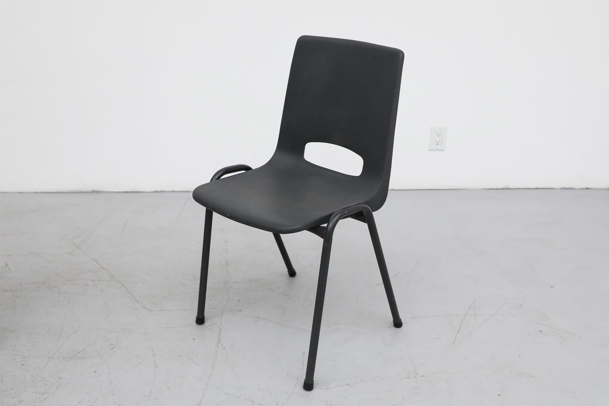 Robin Day Inspired Dark Gray Plastic Stacking Armchairs with Gray Metal Legs In Good Condition For Sale In Los Angeles, CA