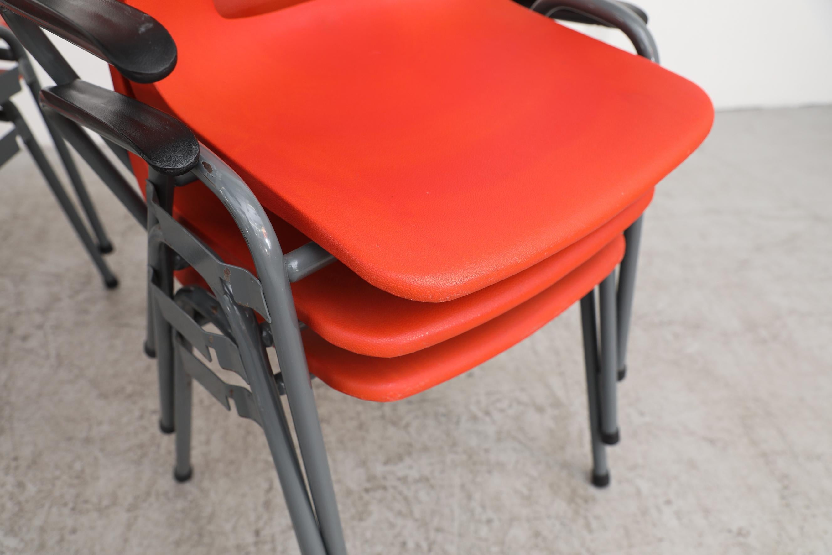 Robin Day Inspired Red Plastic Stacking Arm Chairs with Gray Metal Legs For Sale 6