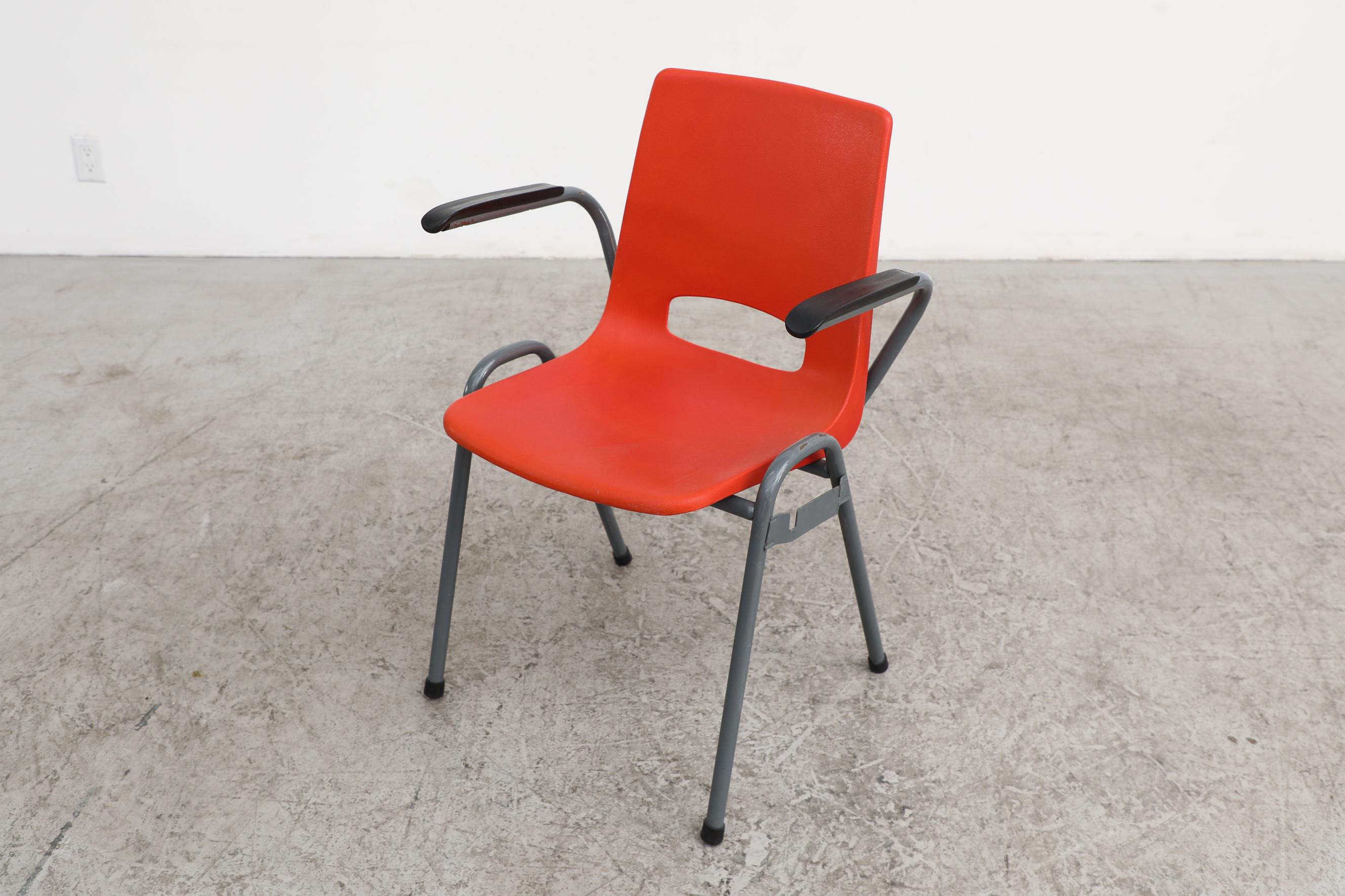 Robin Day Inspired Red Plastic Stacking Arm Chairs with Gray Metal Legs For Sale 2