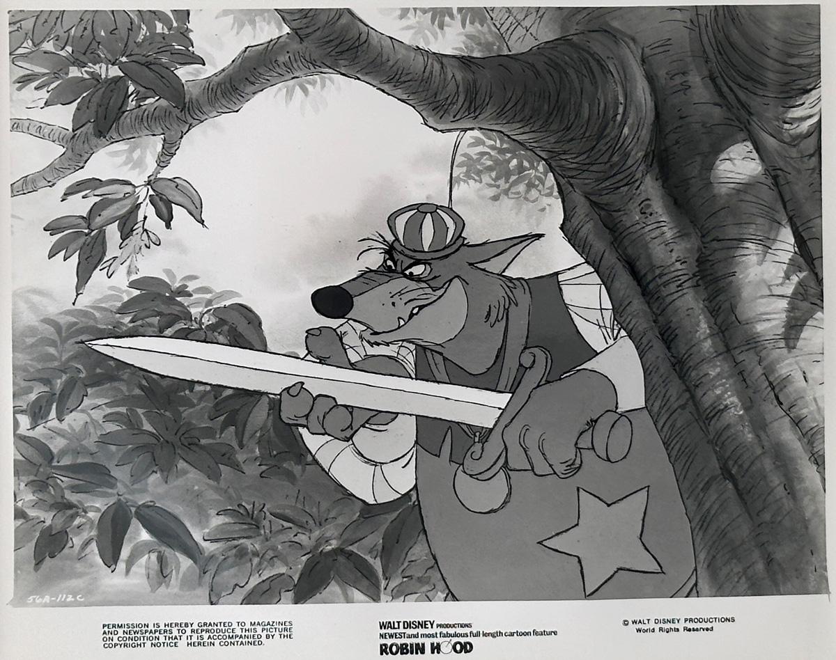 Original Disney 8x10 inches Publicity Still for Robin Hood (1973) featuring a great image of the Sheriff of Nottingham.

Publicity (film/production) stills were created to help studios promote their new films. The stills were included with press