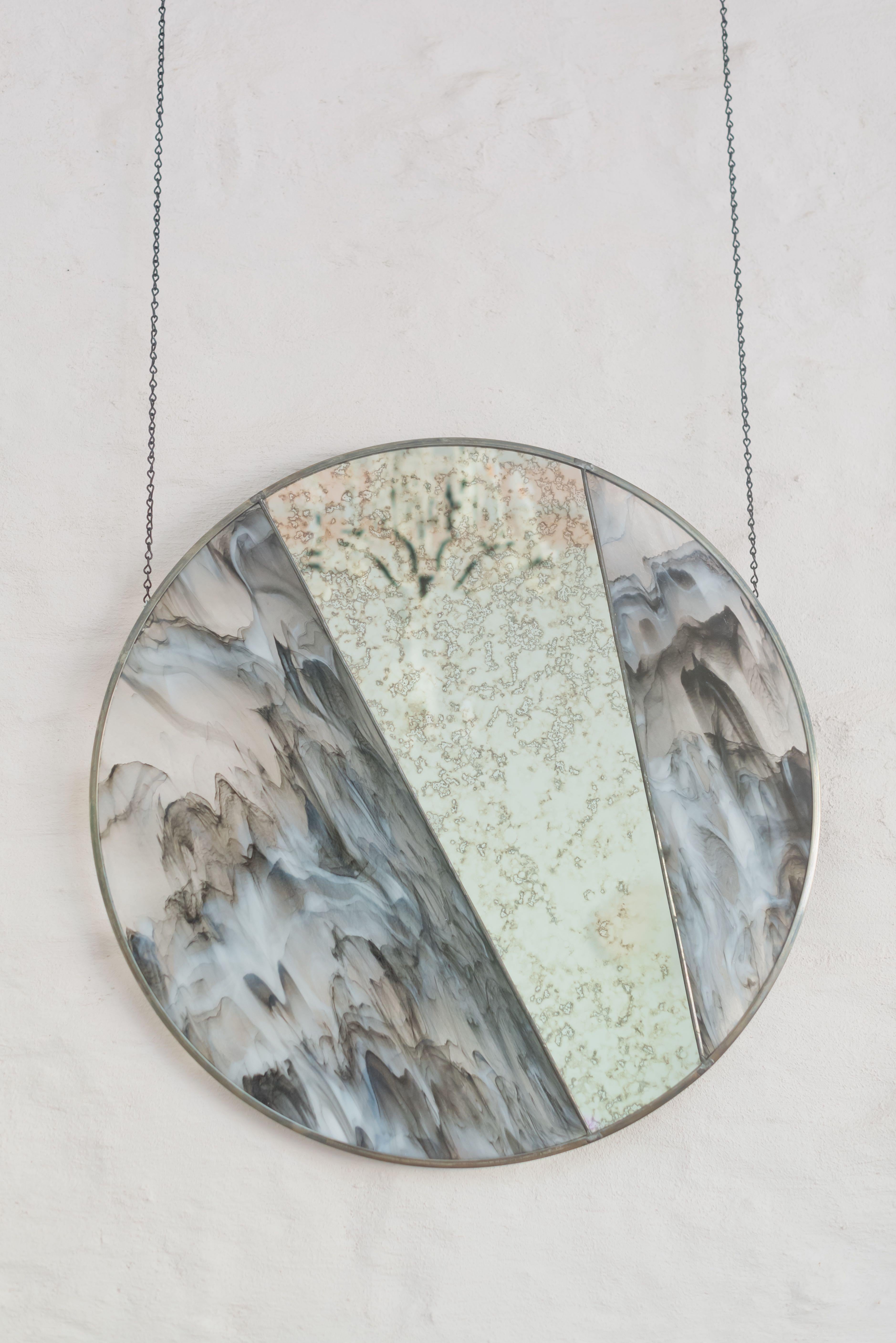 This striking mirror is both dramatic and whimsical. Using artisan stained glass techniques, each piece is created with its own sense of individuality. Stained glass offers nearly endless color and textural options giving you the ability to create