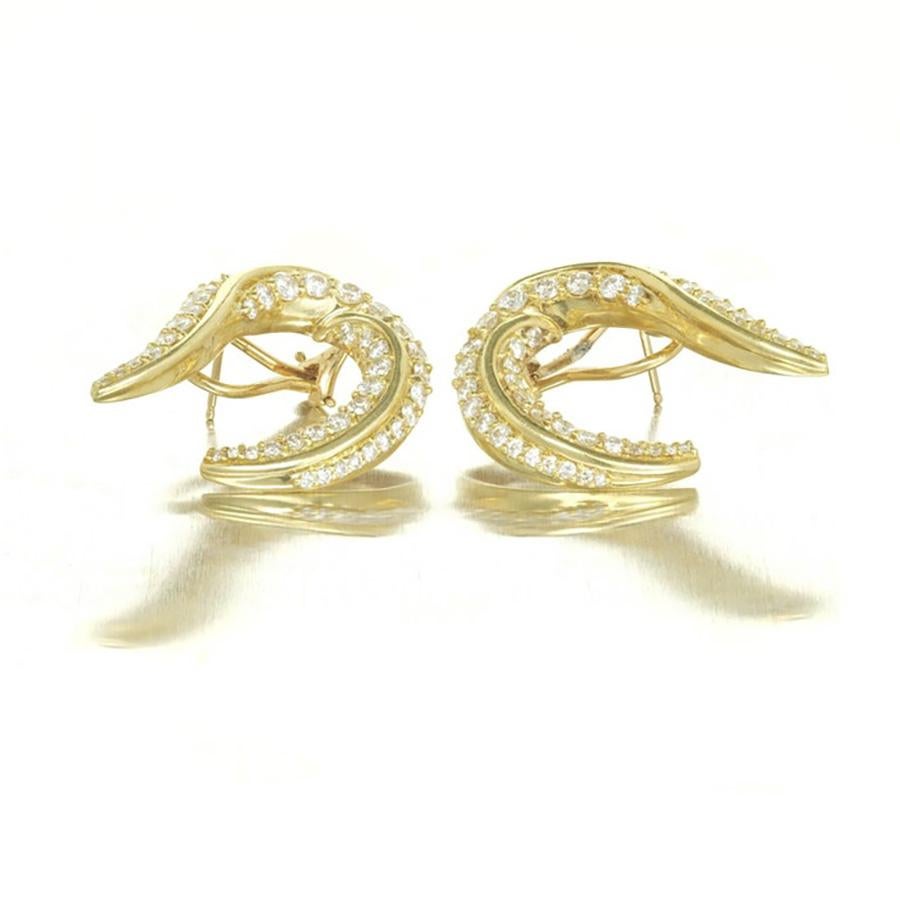 Robin Rotenier diamond 18k yellow old swirl clip post earrings. Radiating timeless beauty, these earrings feature a stunning swirl design encrusted with 78 round diamonds with a total weight of 2.50 carats. The yellow gold clip post settings add a