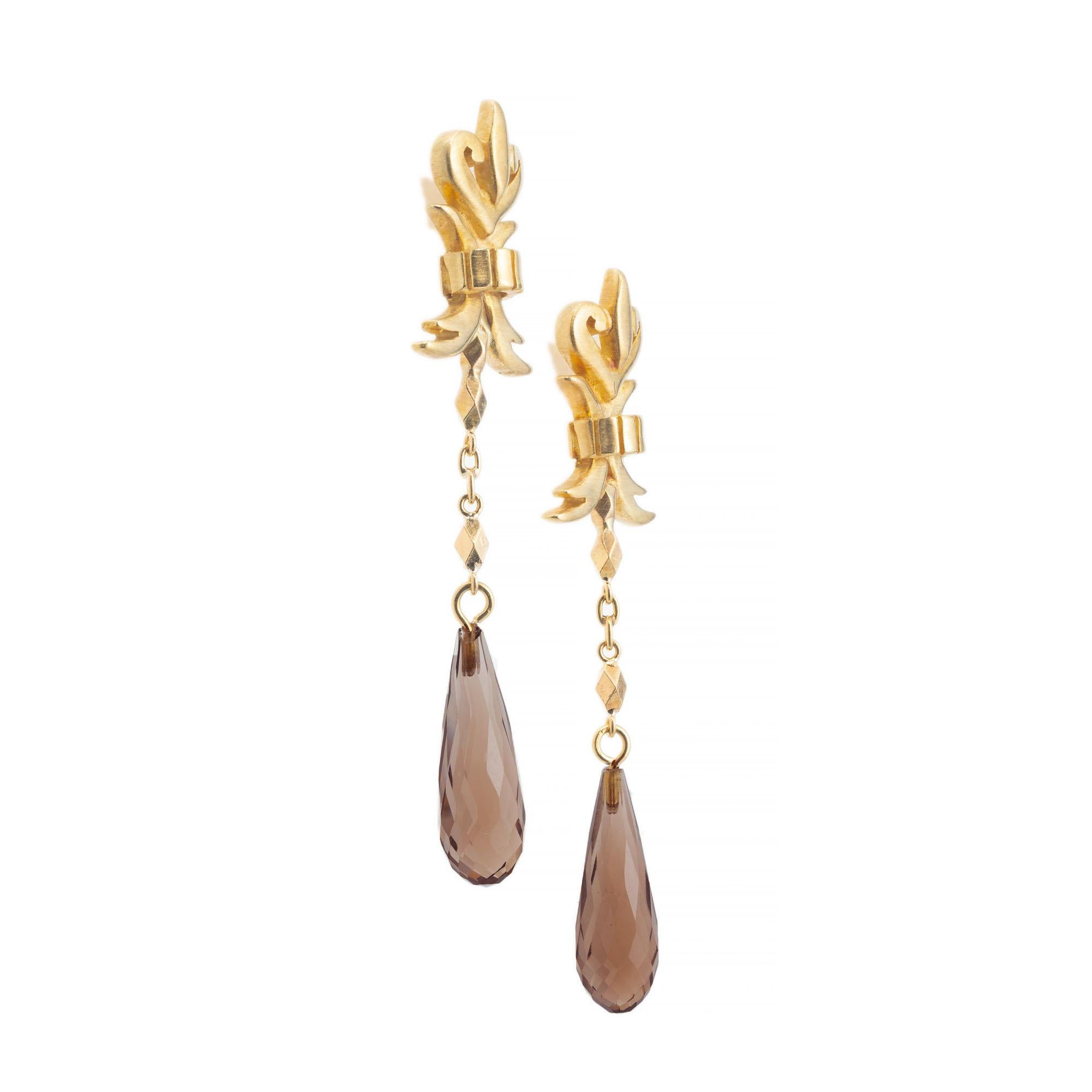 Robin Rotenier smoky quartz tear drop dangle earrings in 18k yellow gold 

2 briolette light dark brown smoky quartz 
18k yellow gold 
Stamped: 18k 750
Hallmark: RR
6.2 grams
Top to bottom: 48.3mm or 1 7/8 Inch
Width: 10.1mm
Depth/ thickness: 5mm
