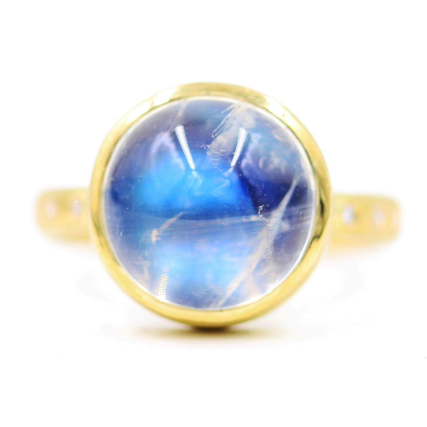 18K Ring Featuring a 5.89ct Blue Moonstone, & VS1 Diamonds (.06ctw)