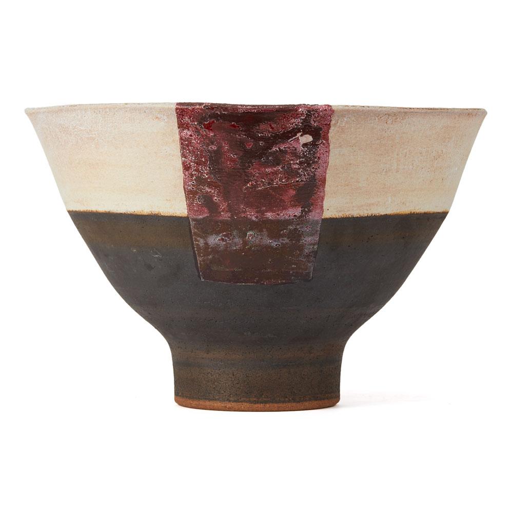 PLEASE NOTE: This piece is currently located in our Amsterdam office, please enquire for delivery times.

A large, vintage British studio pottery stoneware footed bowl by Robin Welch. The rounded bowl stands on a narrow rounded foot and is decorated