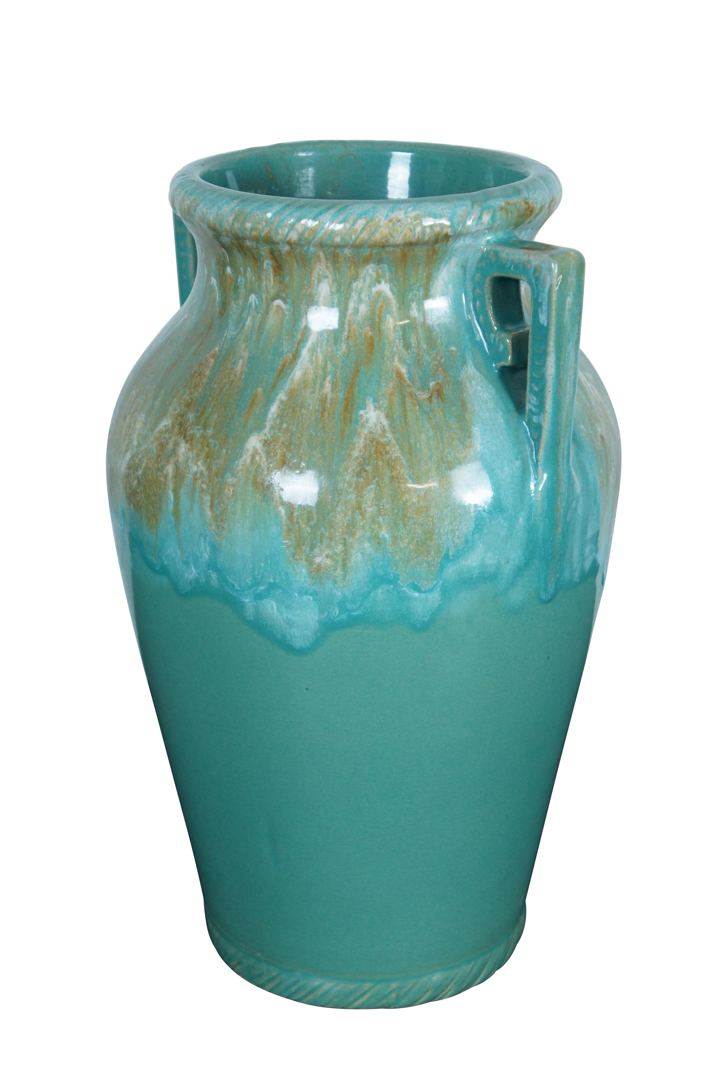Vintage Robinson Ransbottom, number 155 floor vase / urn. Traditional shape with geometric art deco / pseudo Greek Key handles and rope twist edging at the rim and base. Finished in a turquoise green / blue / brown rip glaze. Incised USA 155 on