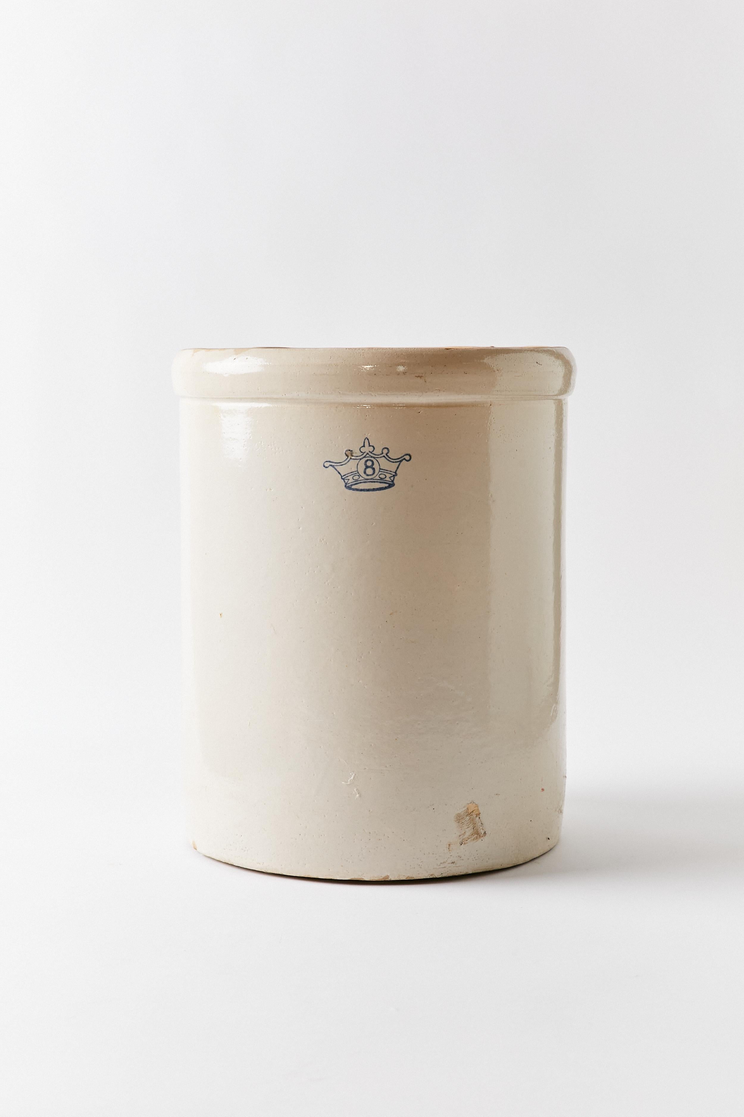 A Robinson Ransbottom eight gallon stoneware crock with the logo of the Ransbottom crown with the number eight inside it. Made in Roseville, Ohio.