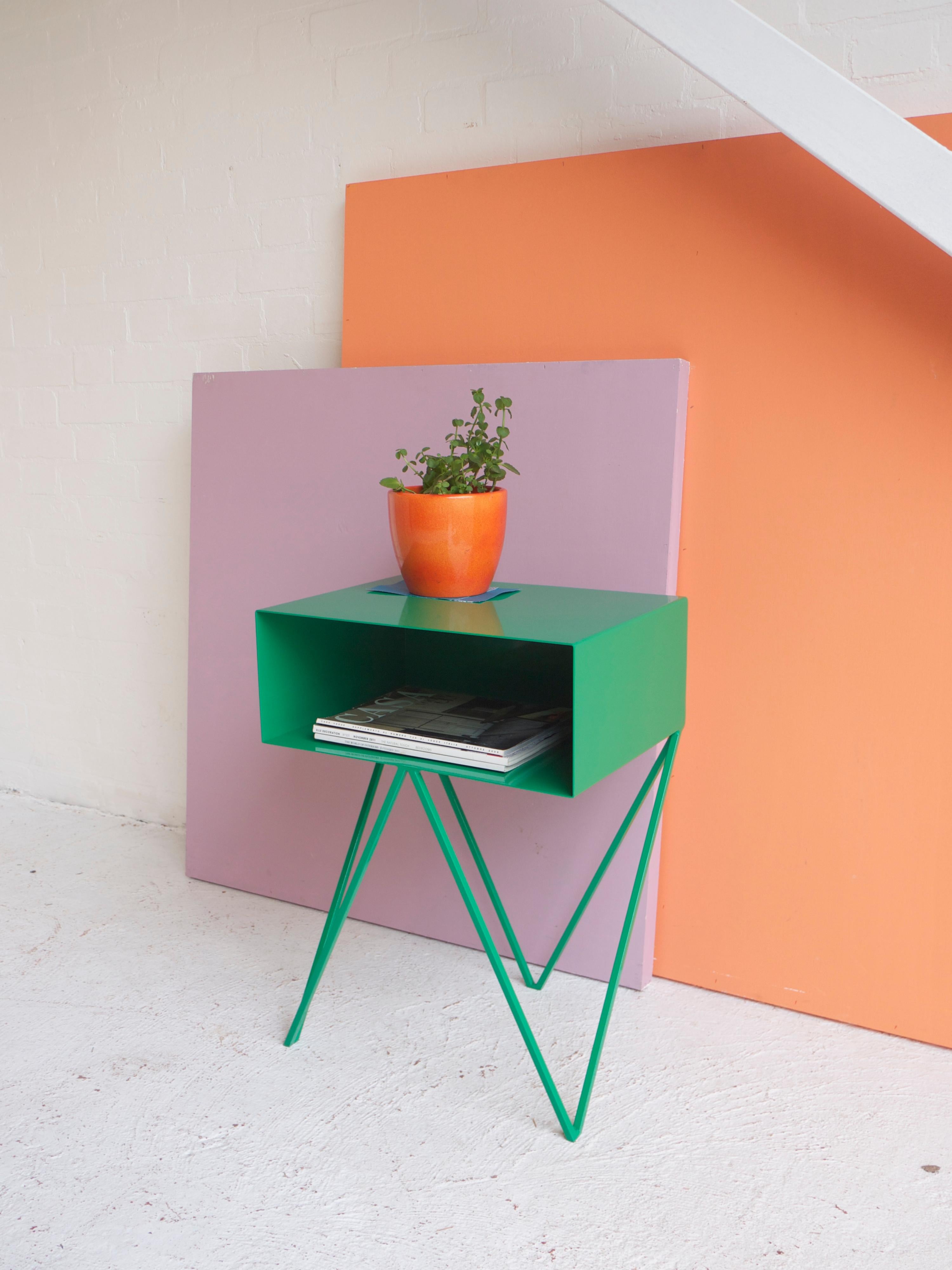 Our all-time best-seller the Robot side table features an open shelf on zig zag legs. A fun and functional design made of solid steel, powder-coated in bright green. The clean lines look great against period details as well as in modern spaces.