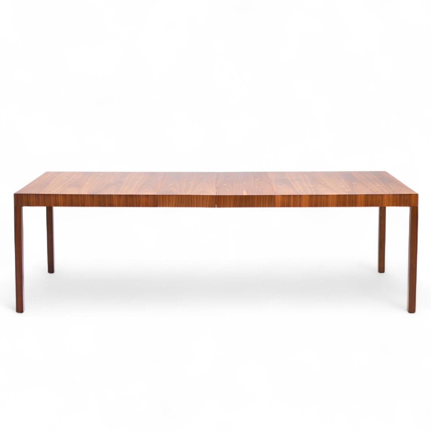 Robsjohn Gibbings for Widdicomb Constellation Mid Century Walnut Expanding Dining Table with 2 Leaves

This table measures: 68 wide x 40 deep x 29.25 inches high, with a chair clearance of 26.25 inches, each leaf measures 14 inches wide, making a