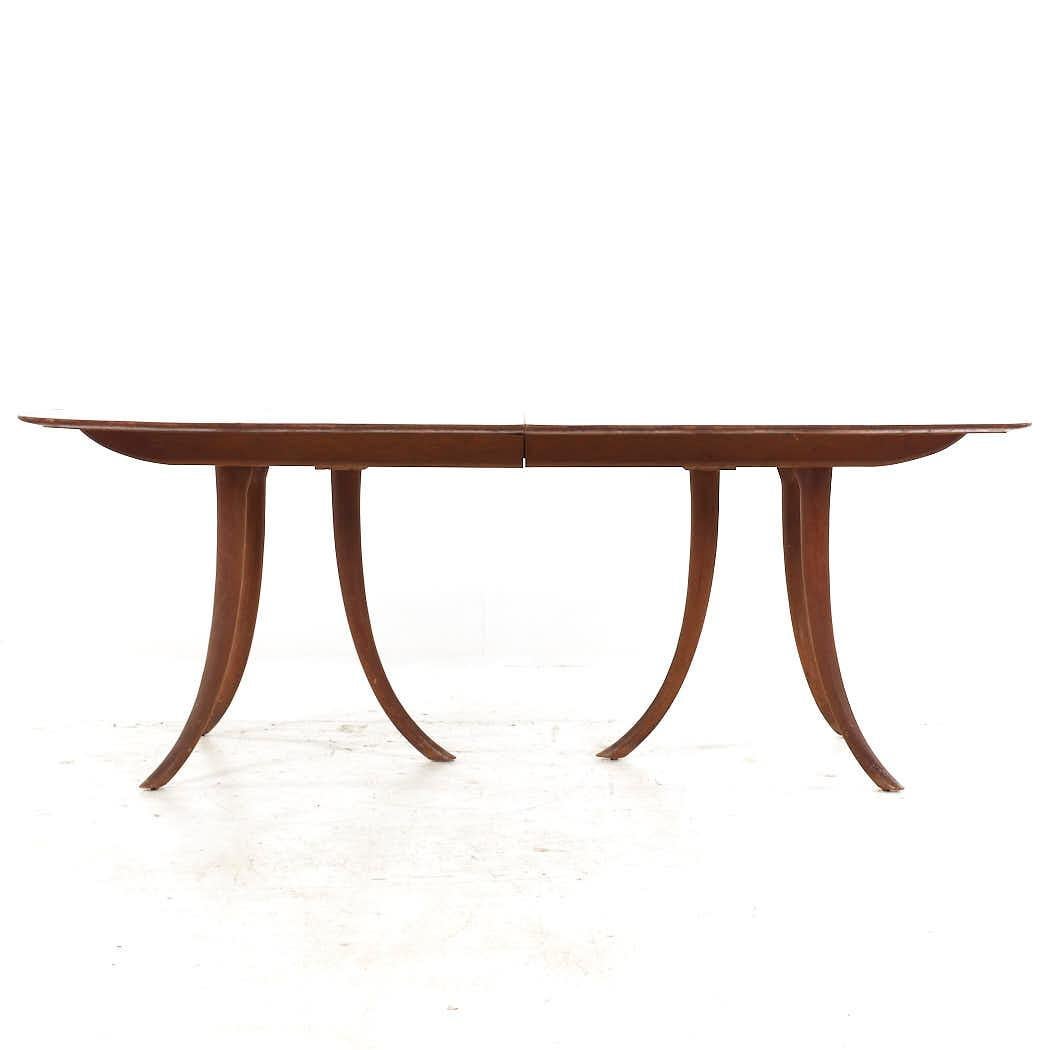 Robsjohn Gibbings for Widdicomb Mid Century Saber Leg Expanding Dining Table with 3 Leaves

This table measures: 78 wide x 44 deep x 29.5 inches high, with a chair clearance of 28 inches, each leaf measures 14 inches wide, making a maximum table