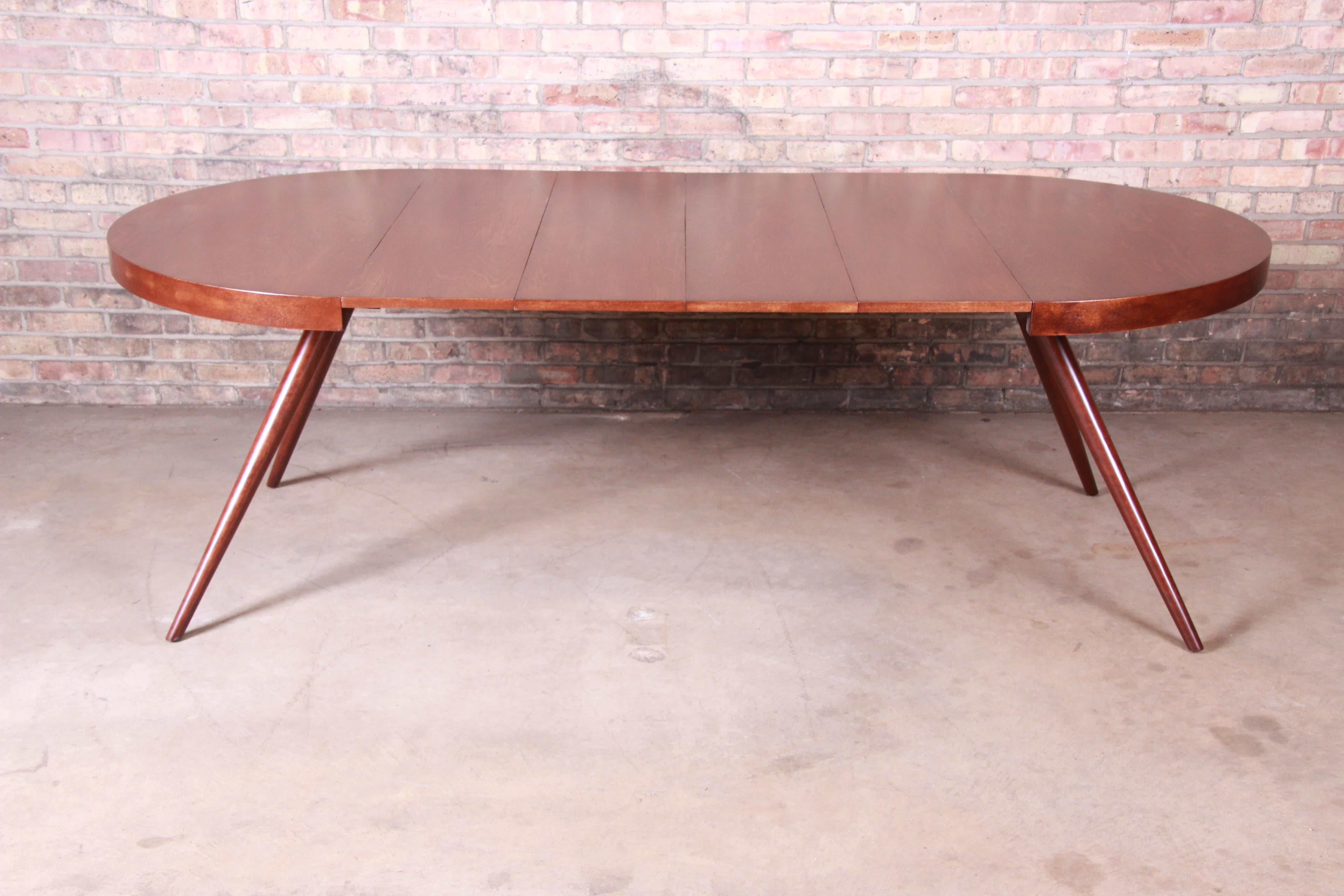 A rare and exceptional Minimalist Mid-Century Modern splayed leg extension dining table

By T.H. Robsjohn-Gibbings for Widdicomb

USA, 1950s

Measures: 44