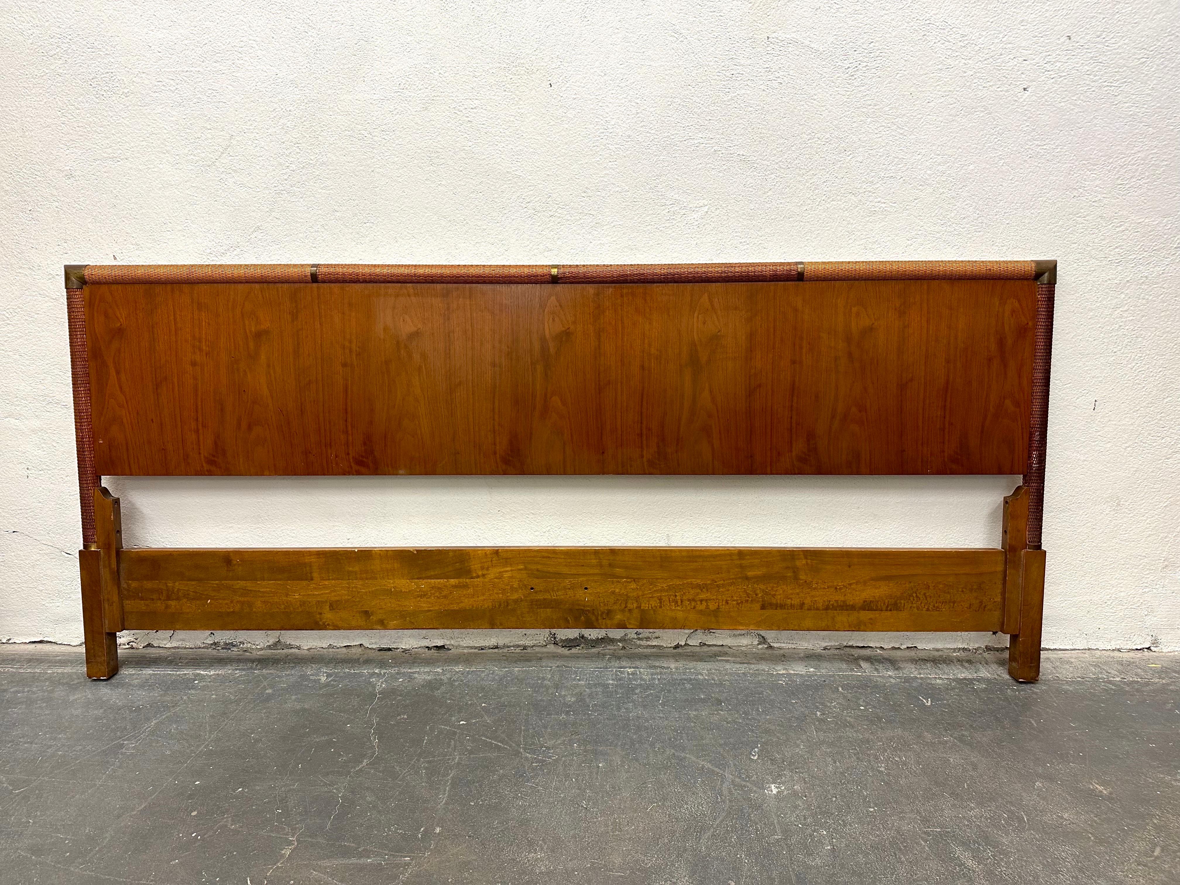 Beautiful Robsjohn-Gibbings for Widdicomb king-sized bed headboard.  Walnut and brass with raffia caning. Can easily fit any bed frame.  