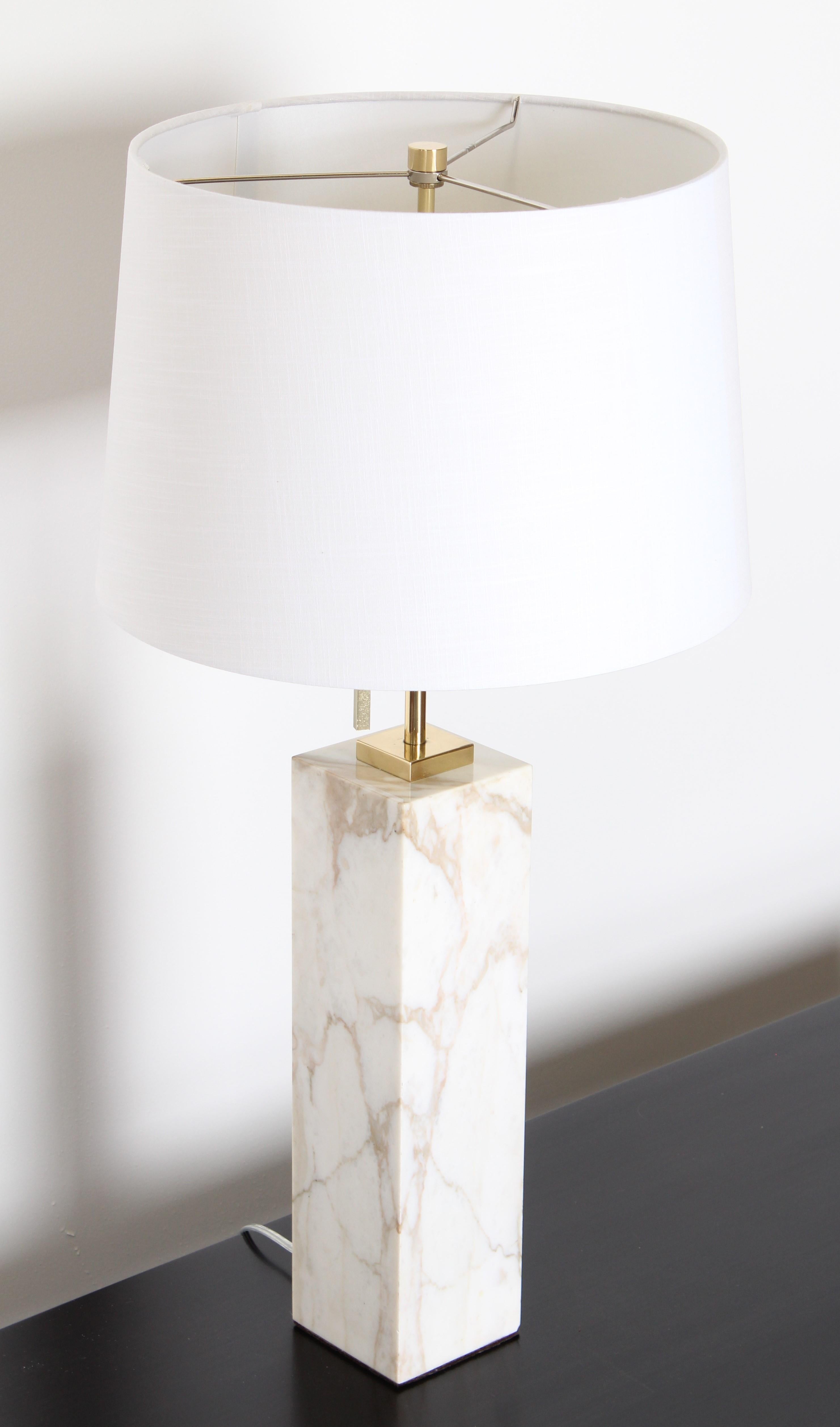 A Robsjohn-Gibbings marble lamp with white and cream tones by Hansen Lighting, 1950s. Recently rewired and new polished hardware. Shade not included.