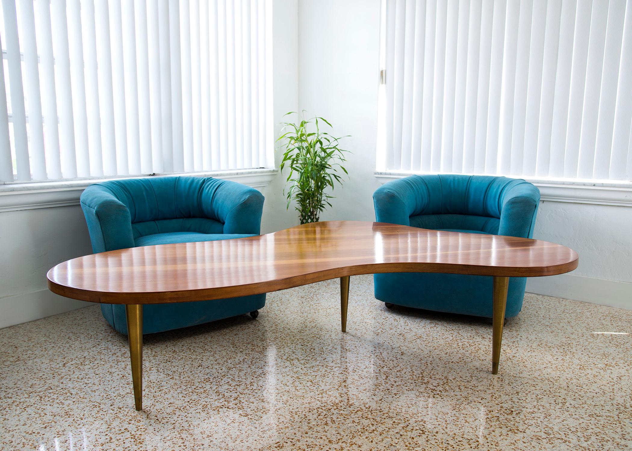Original iconic biomorphic Freeform coffee table designed by TH Robsjohn Gibbings and produced by Widdicomb furniture circa 1950. Sold by John Stuart Inc- This rare early version (2/1950) large  72”x 42” x20” scale table is in excellent
