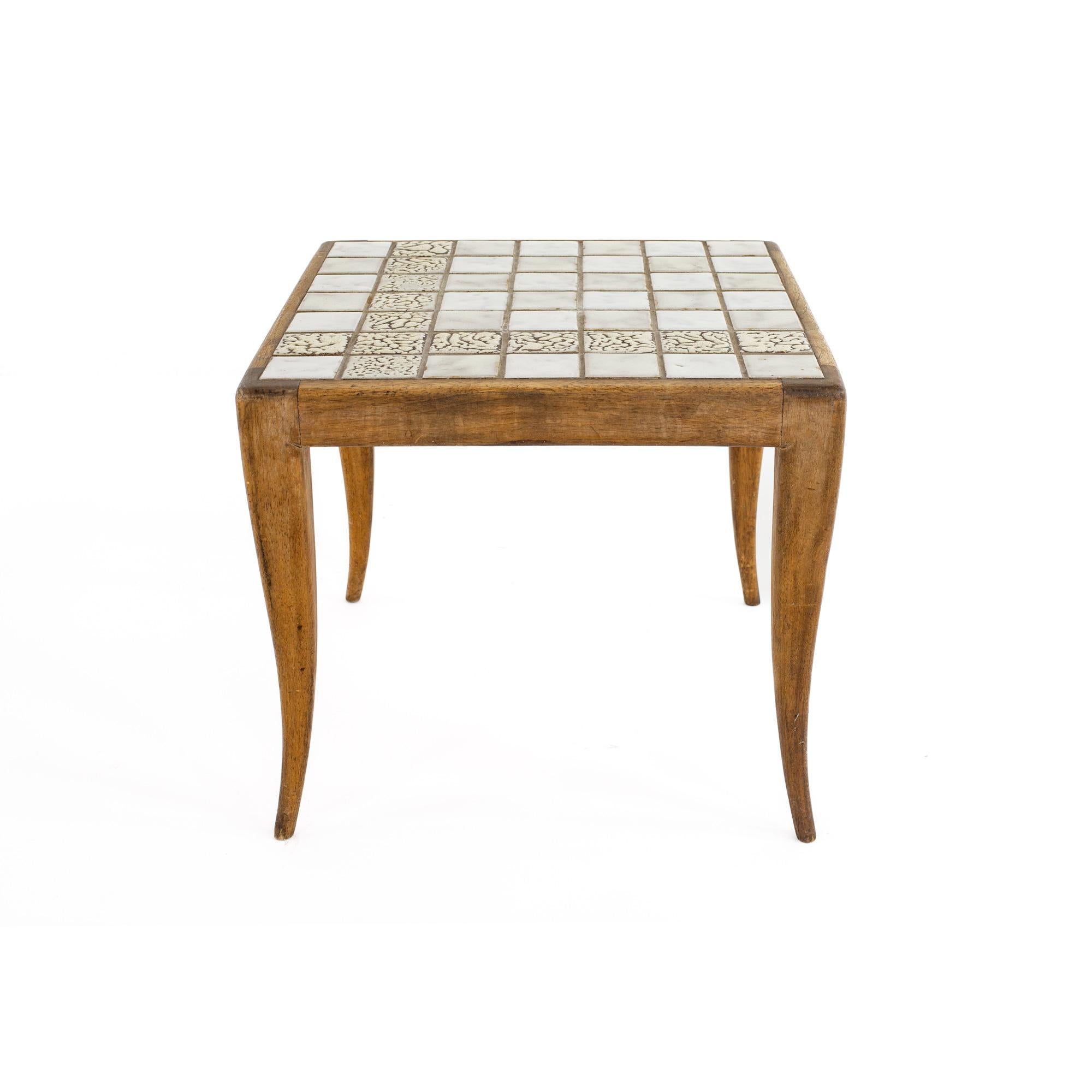 Robsjohn Gibbings style mid century tile top side table

This table measures: 17.5 wide x 17.5 deep x 15 inches high

All pieces of furniture can be had in what we call restored vintage condition. That means the piece is restored upon purchase