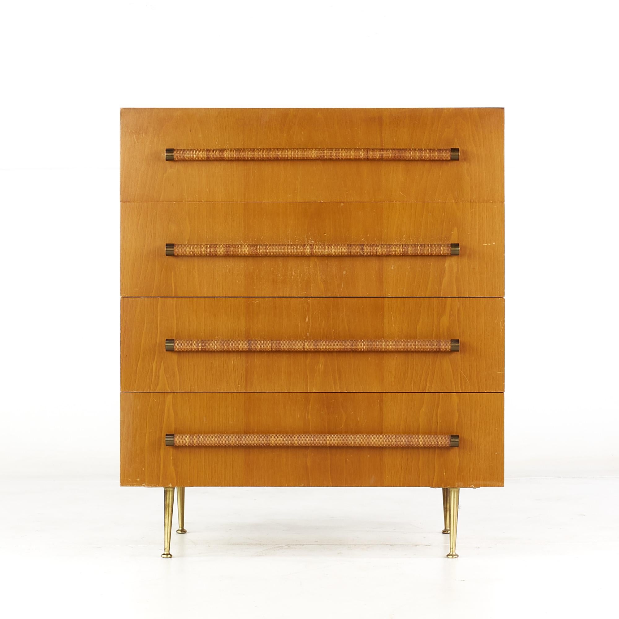 Robsjohn gibbings for widdicomb mid century 4 drawer walnut cane and brass highboy dresser.

This highboy dresser measures: 34.5 wide x 21.25 deep x 40.75 inches high.

All pieces of furniture can be had in what we call restored vintage