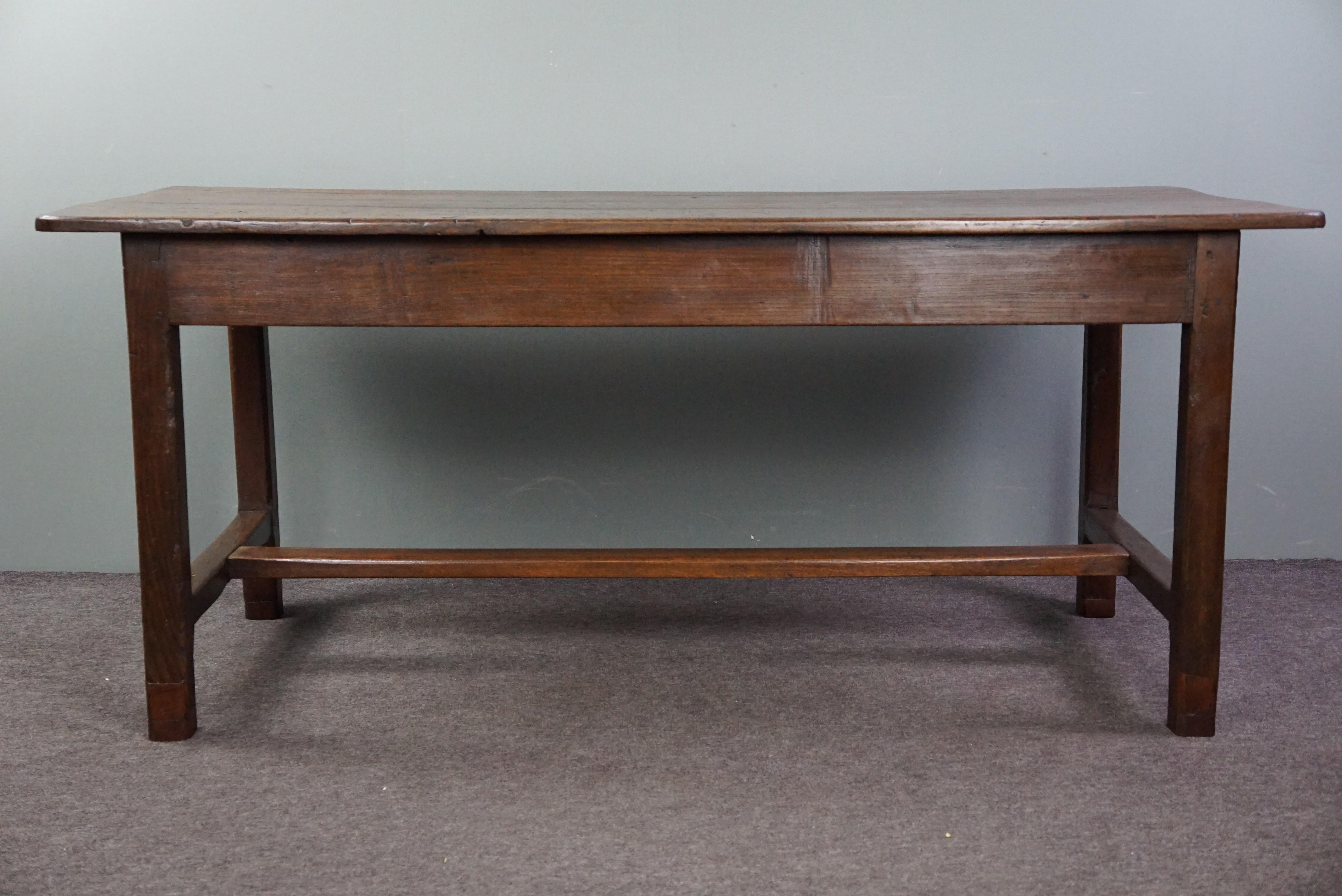 Wood Robust antique French dining table made of oakwood, early 19th century For Sale