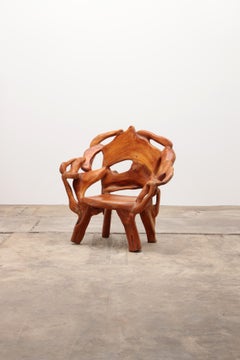 Robust Armchair Made of Recycled Wood in the Style of Andrianna Shamaris US