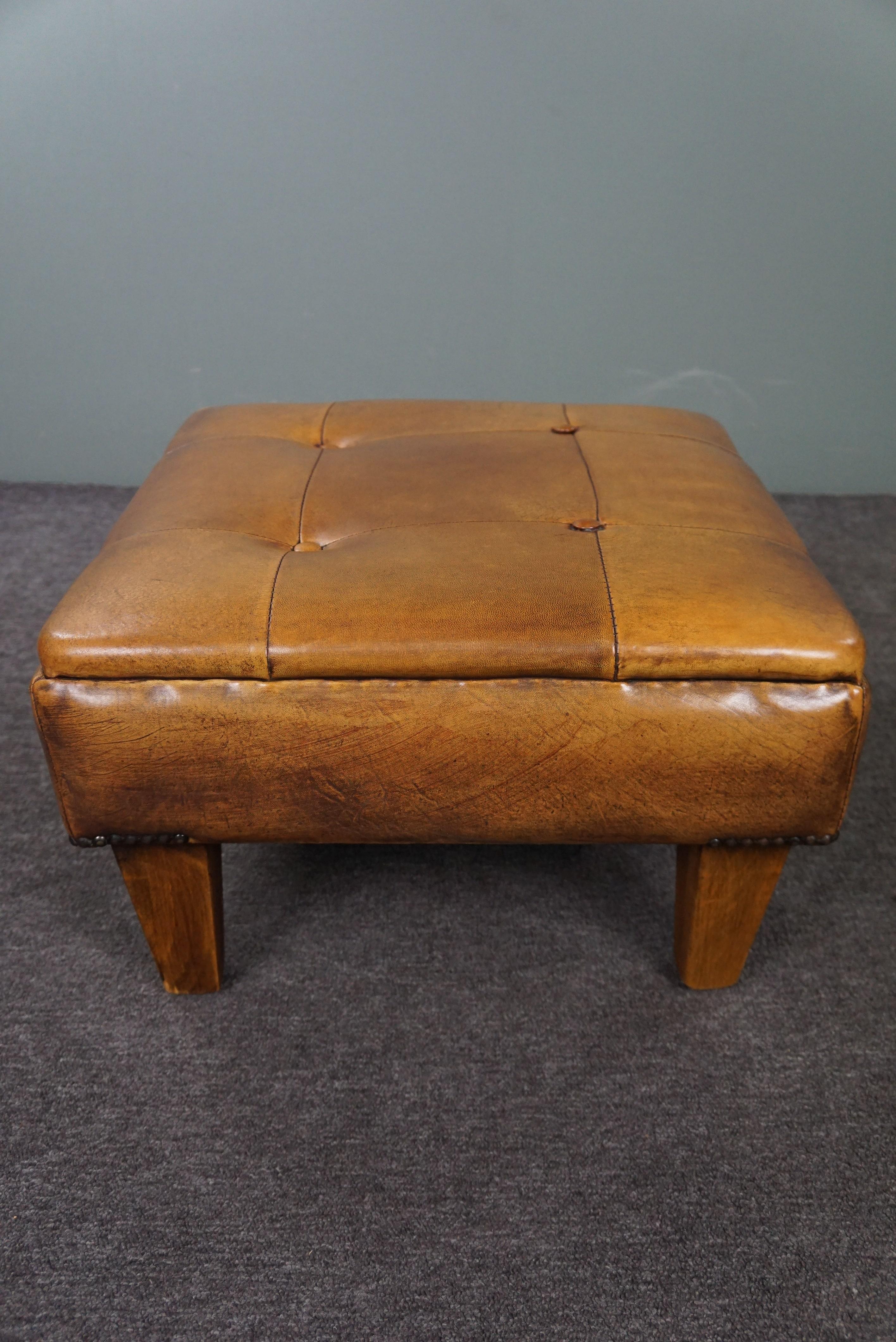 Late 20th Century Robust button-tufted sheepskin leather ottoman For Sale