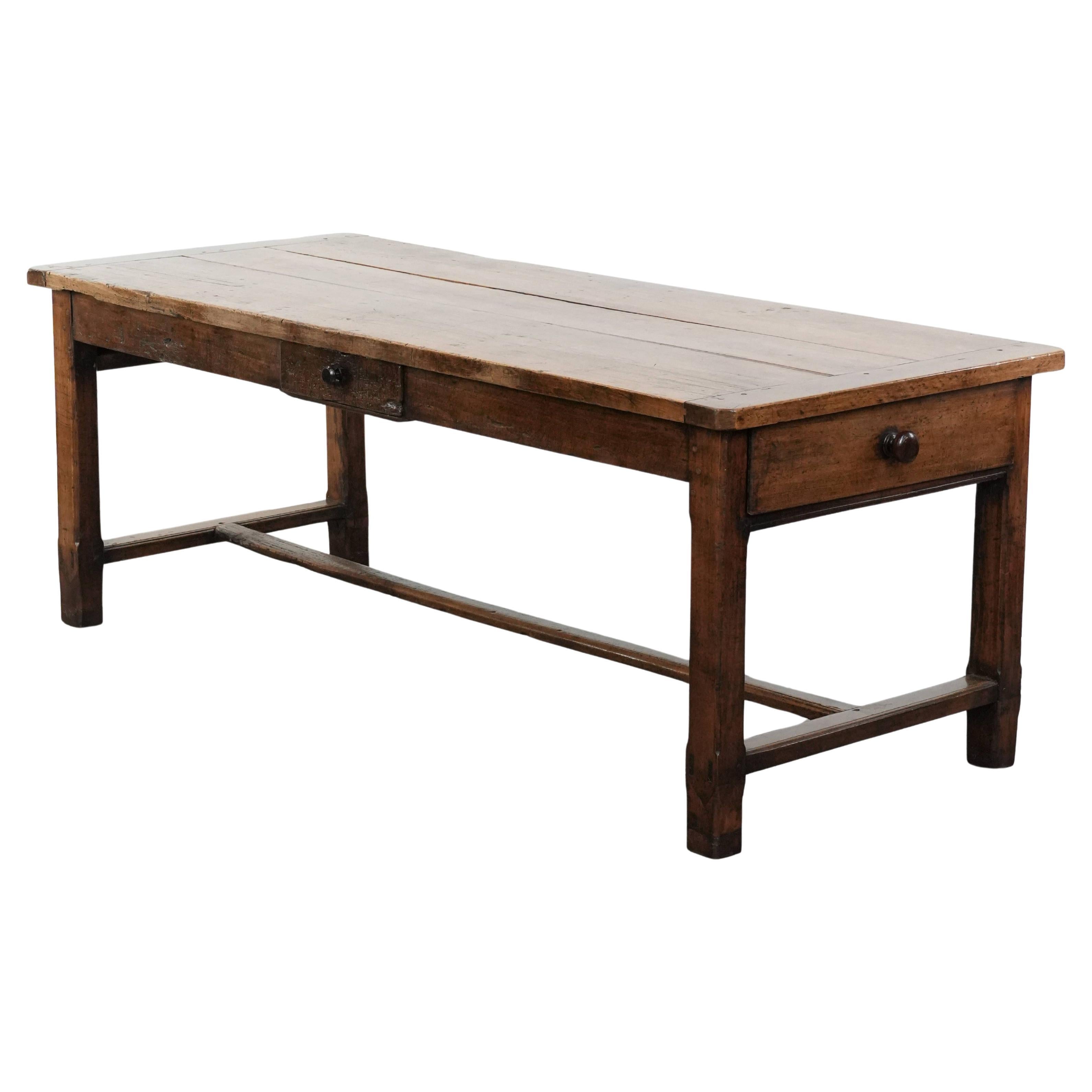 Robust French farmhouse antique dining table from the 18th century For Sale