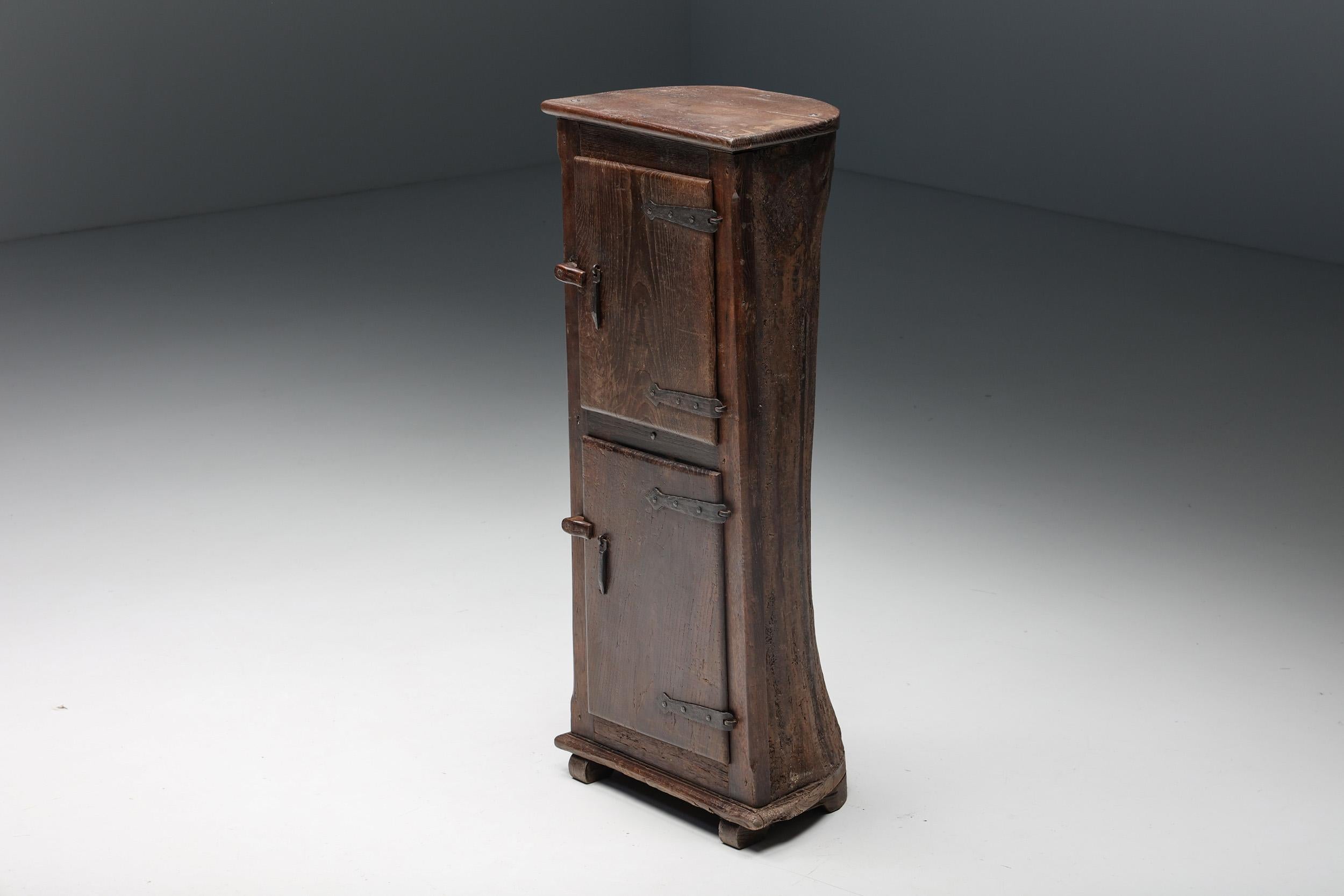 Robust; Rustic; cupboard; Wabi Sabi; doors; Solid Chestnut; Spain; early 20th century;

20th-century, art populaire, folk art, monoxylite cupboard made of solid chestnut wood. This rustic, organic cabinet provides sufficient storage space with