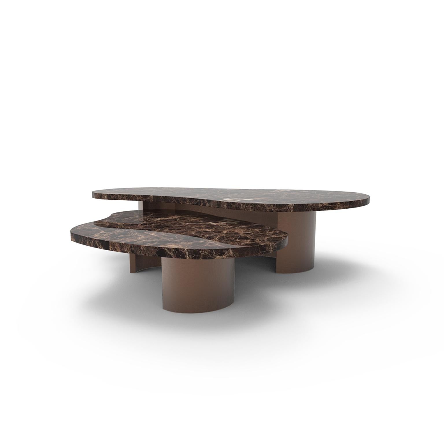 Contemporary Modern Robusta Marble Center Table by Caffe Latte

A Contemporary Modern Robusta Marble Center Table by Caffe Latte with an uneven shape made of emperador dark marble on its tops and epoxy iron bronze matte varnish on the feet. Taking