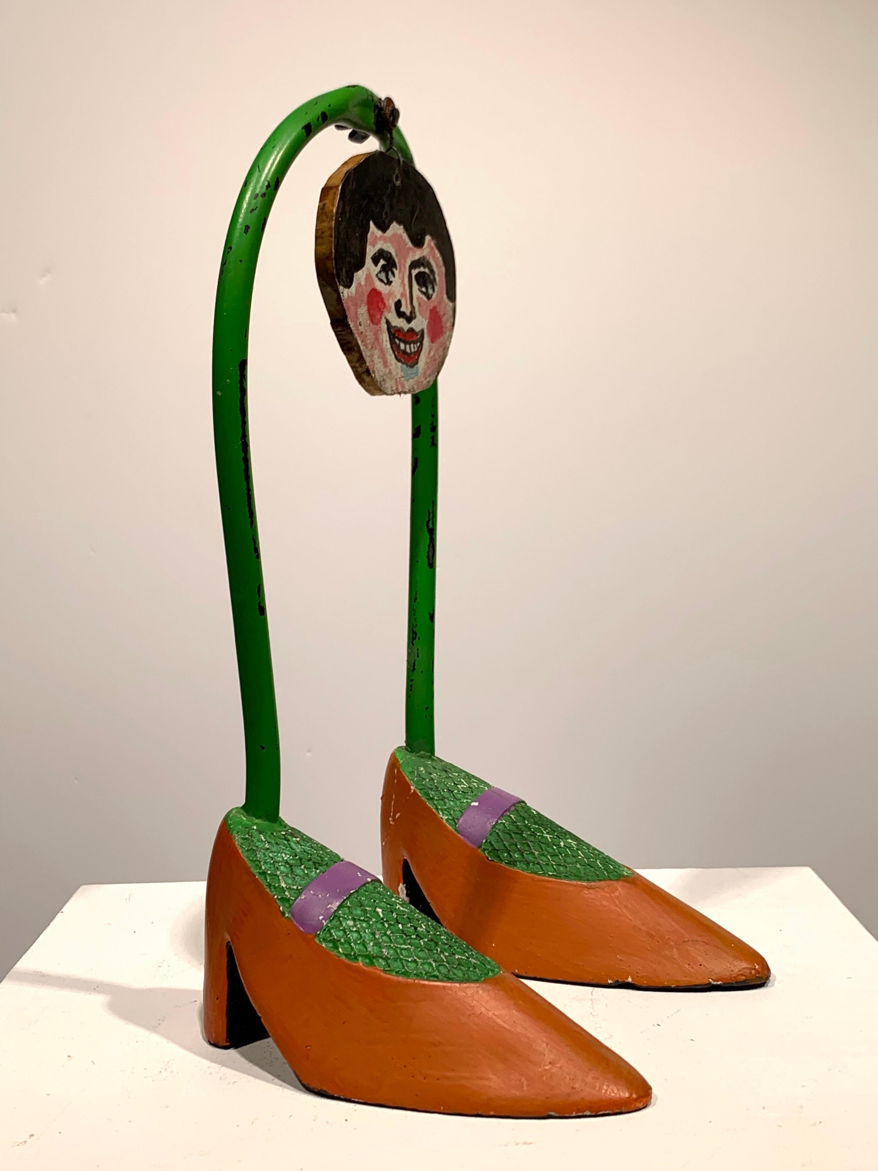 Rocco Monticolo (b. 1931). Untitled, 2022. Found antique object, wood, paint. Signed on reverse of face. 

Monticolo was born in Italy in 1931 and came to America in 1946. He joined the USAF in 1950. He attended the Hussain School of Art in