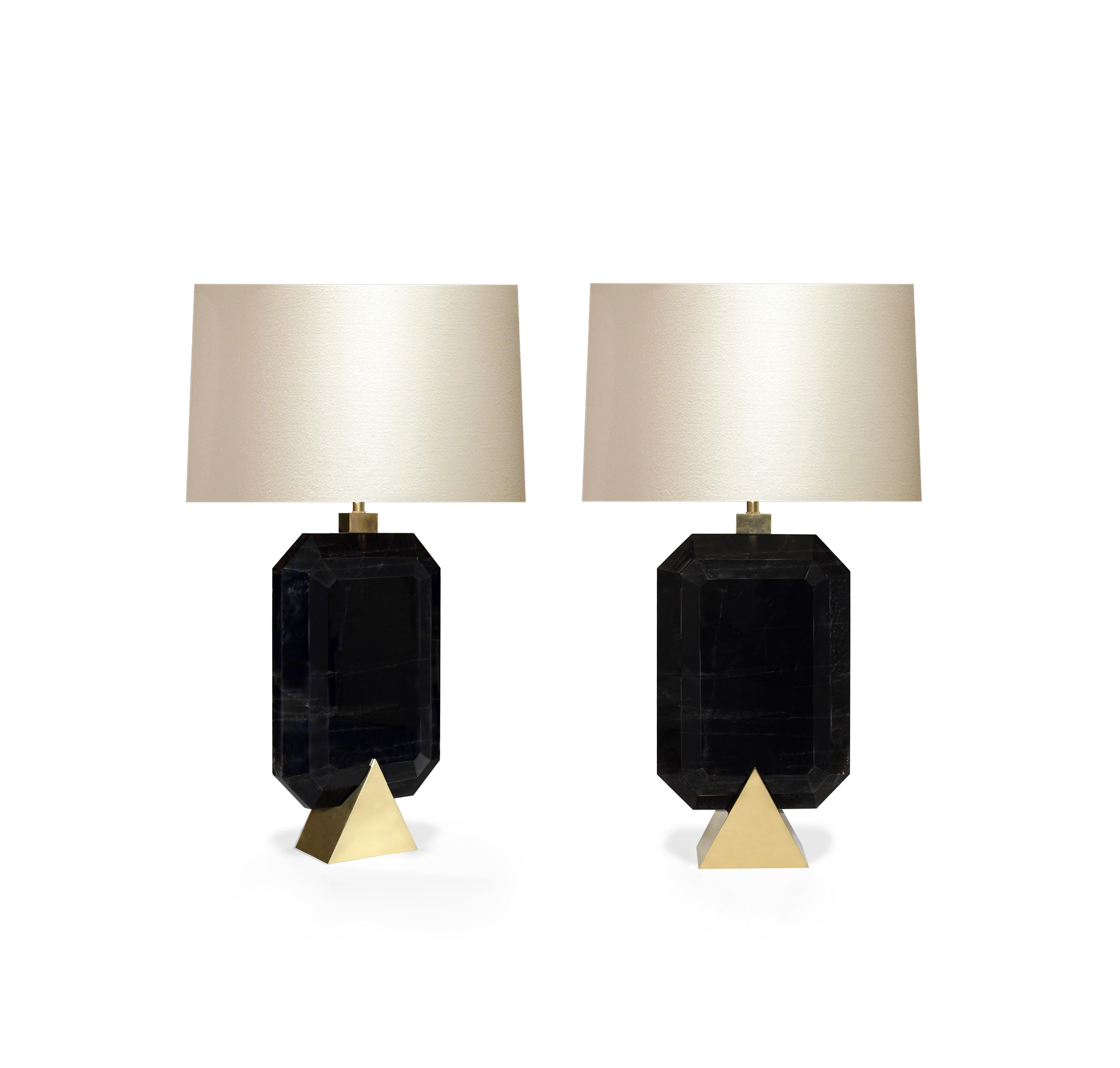 Pair of fine carved smoky rock crystal lamps with polished brass bases. Created by Phoenix Gallery.
To the top of rock crystal height: 13.5inch.
(Lampshade not included).