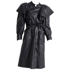 Vintage Roccobarocco coat in black leather for woman 1980's.