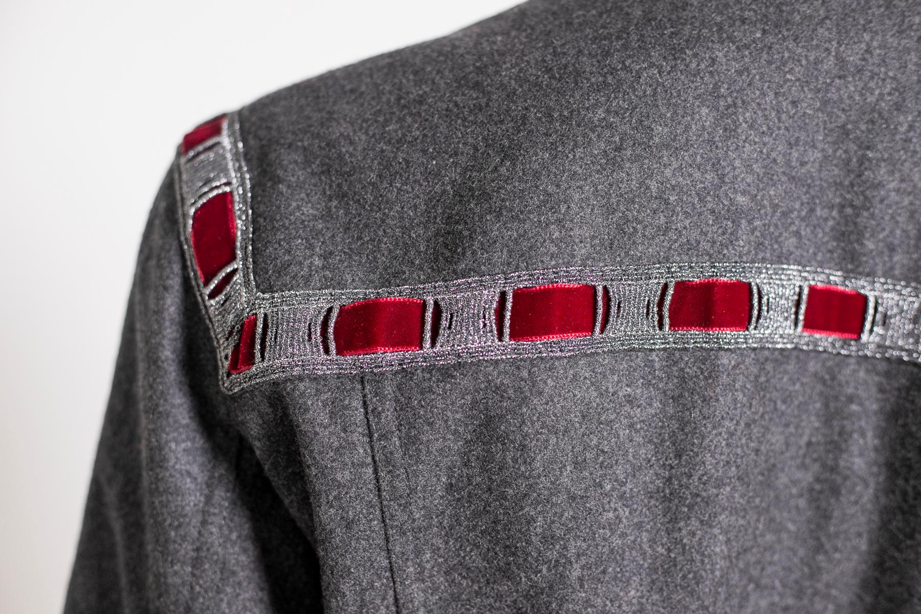 black denim jacket with red stitching