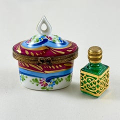 Bouteille de parfum Rochard Limoges Paris dans une boîte en porcelaine