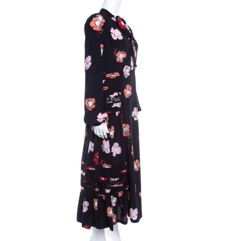 Expect style and class with this luxurious piece from the house of Rochas. Pair this dress with dainty accessories for an added feminine flair. Flawlessly designed in a silk blended fabric, it has floral prints and pintuck detailing, long sleeves