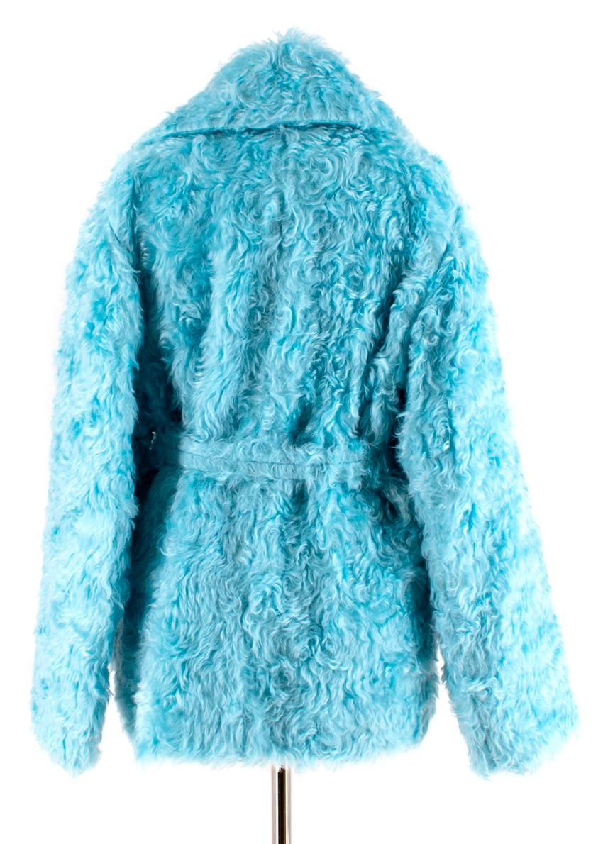 Rochas Blue Faux Fur Coat with Belt 

- Blue & cream lining 
- Two front patch pockets 
- Chunky collar 

Materials:
Faux Fur:
- 69% Mohair
- 31% Cotton
Lining:
- 100% Silk 
Sleeve lining:
- 100% Viscose

Dry clean only 

Made in Italy 
Measurements