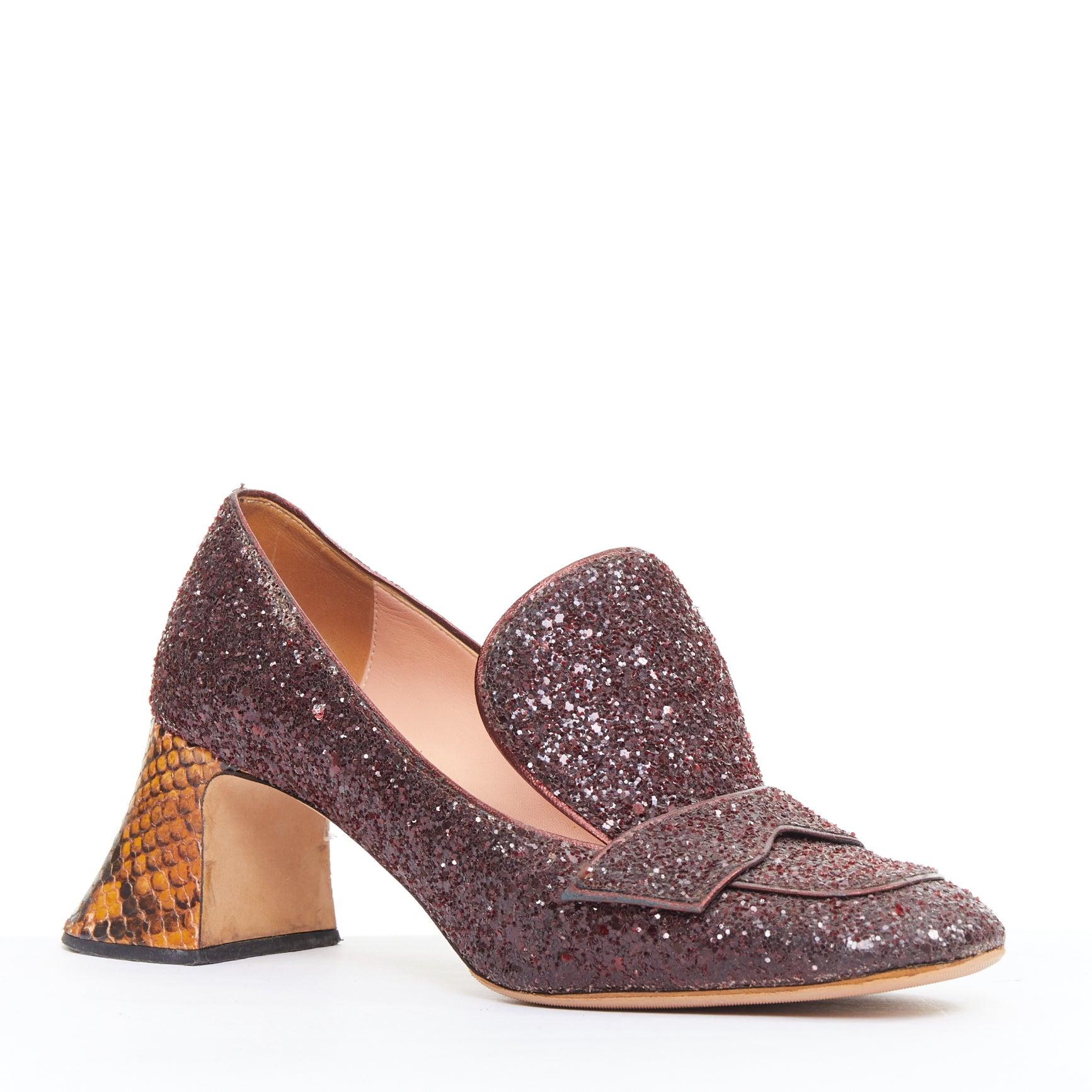 ROCHAS burgundy glitter brown scaled leather sculpted heel loafers EU36
Referenz: JACG/A00231
Marke: Rochas
MATERIAL: Leder
Farbe: Burgunderrot, Braun
Muster: Tiermuster
Verschluss: Slip On
Innenfutter: Rosa Leder
Hergestellt in:
