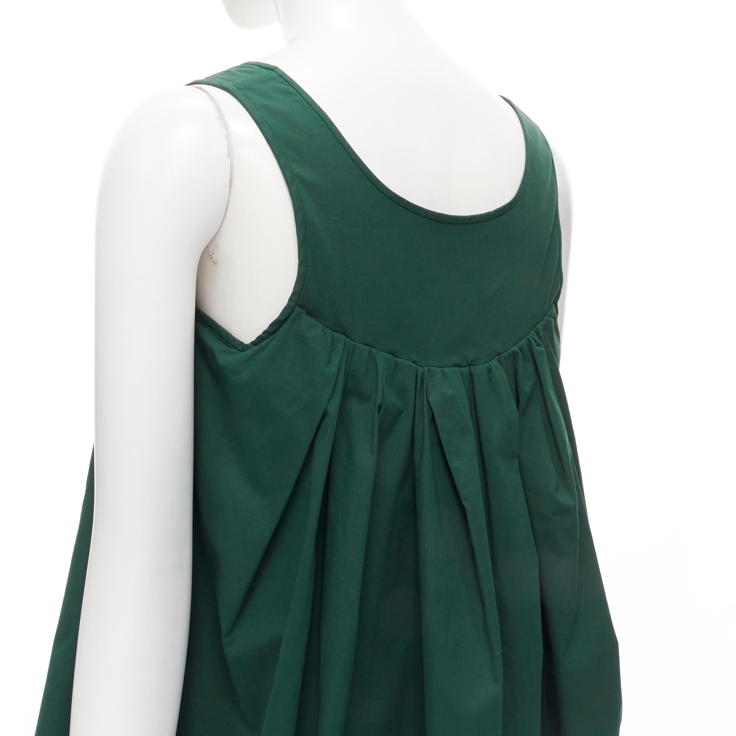 ROCHAS dark green cotton blend flared back vest wide leg pants FR38 S 
Reference: LNKO/A01887 
Brand: Rochas 
Material: Cotton 
Color: Green 
Pattern: Solid 
Extra Detail: Pleated flared back high low hem voluminous top. Self tie belt wide leg