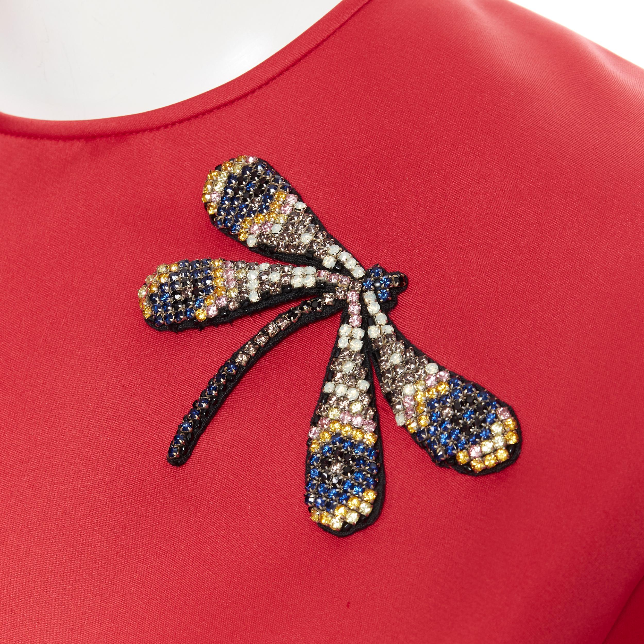 ROCHAS dragonfly crystal embellished red polyester short sleeve boxy top IT38 XS
Brand: Rochas
Model Name / Style: Boxy top
Material: Polyester
Color: Red
Pattern: Solid
Closure: Button
Extra Detail: Crystal dragonfly embroidery design. Boxy fit.