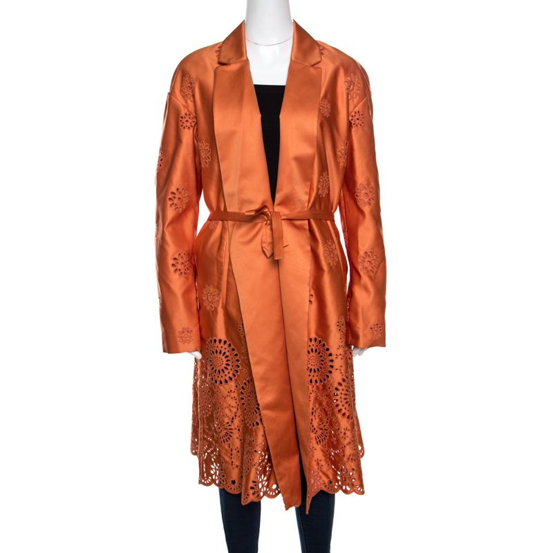 Make sure you are style-ready, regardless the season, by adding this gorgeous overcoat by Rochas to your closet. Made from silk, it features a belt at the waist and eyelet embroidery all over.

Includes: The Luxury Closet Packaging, Original Hanger

