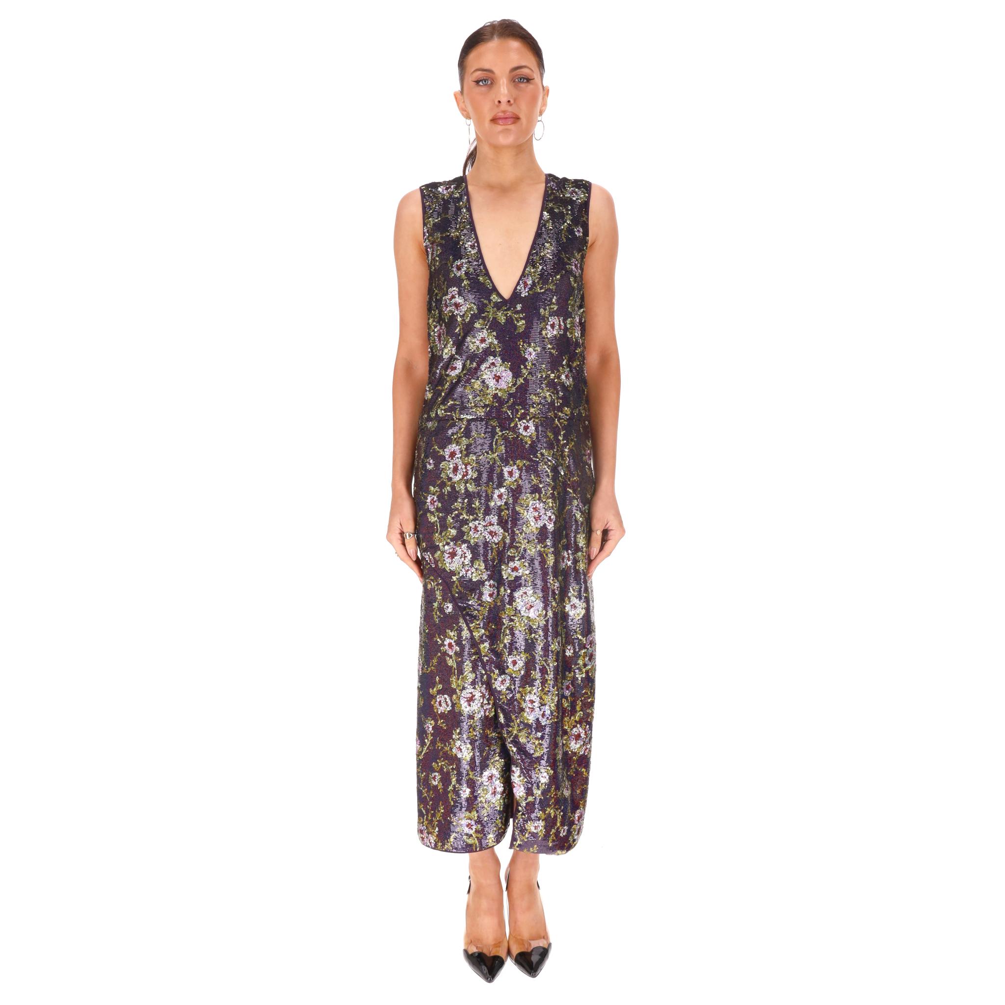 Rochas - Robe midi ornée de paillettes

Robe violette entièrement embellie de paillettes avec un motif floral en or, argent et rouge.

Décolleté en V profond, silhouette enveloppante avec fente latérale et fermeture à glissière à l'arrière.

Rrp