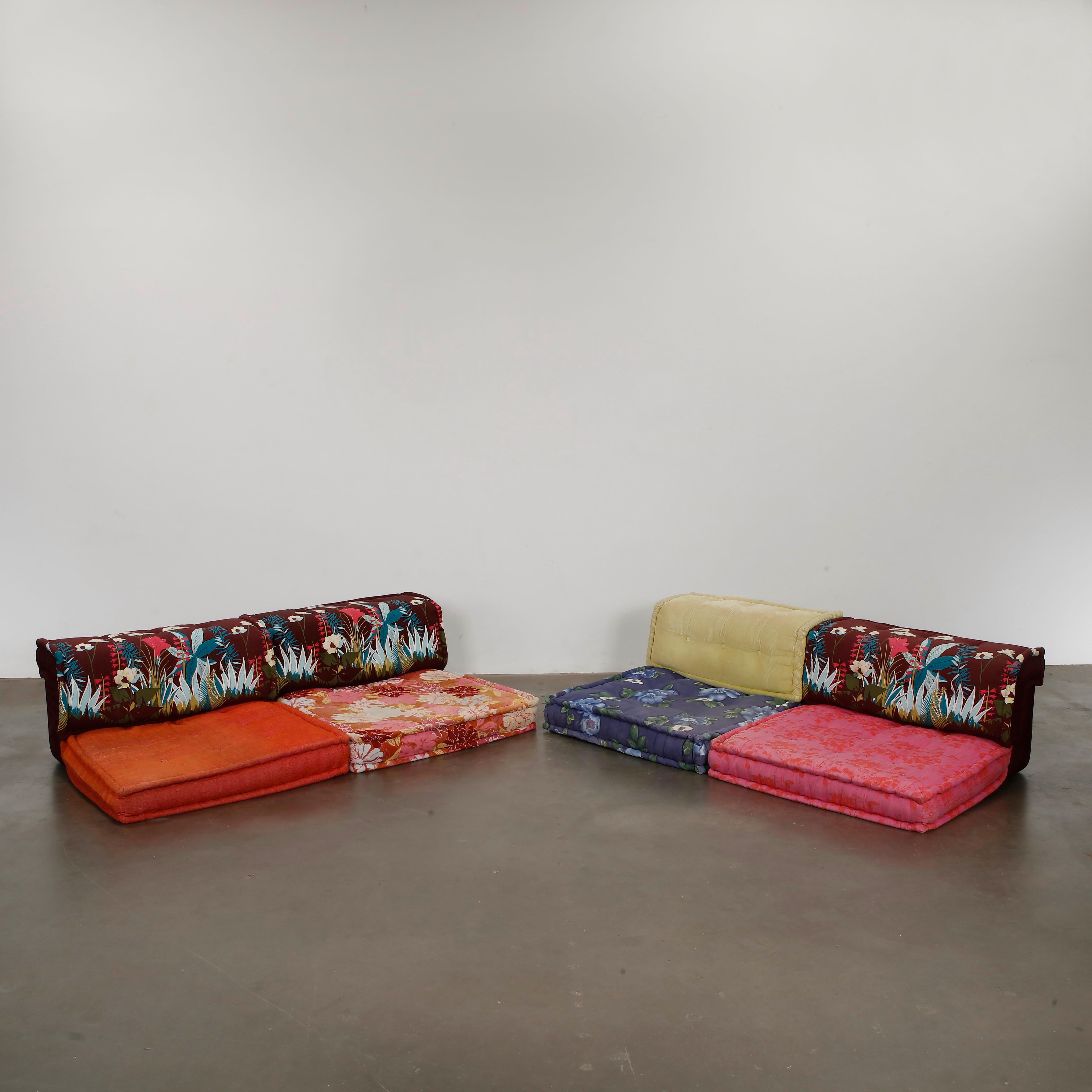 A rare 8-piece installation of the Mah Jong sofa system, highlighting Hopfer signature layering technique and exuberant textile palette. Floor Pillows: Height: 7 in. Width: 37.5 in. Depth: 37.5 in. Back Rest Height: 27 in. Width: 37.5 in. Depth: