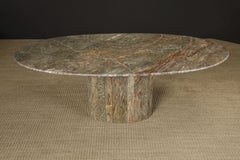 Mesa de comedor de mármol rosa y gris atribuida a Roche Bobois, hacia la década de 1980