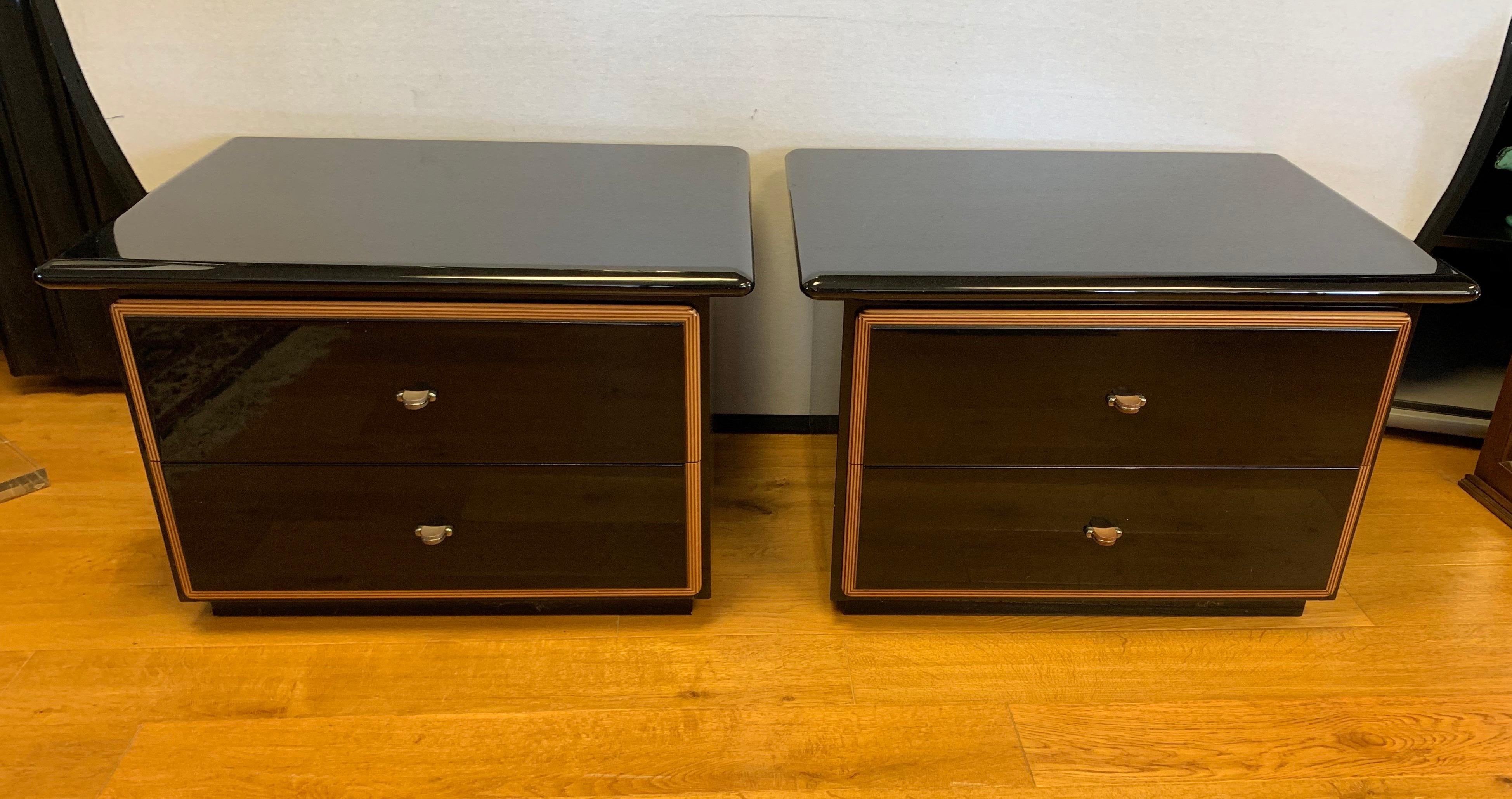 Roche Bobois pair of black lacquer sleek nightstands. Part of a larger Roche Bobois bedroom set that
we are selling separately on 1srDibs this week. This set was designed by Pierre Cardin, circa 1980s.
Made in Italy tags present.
