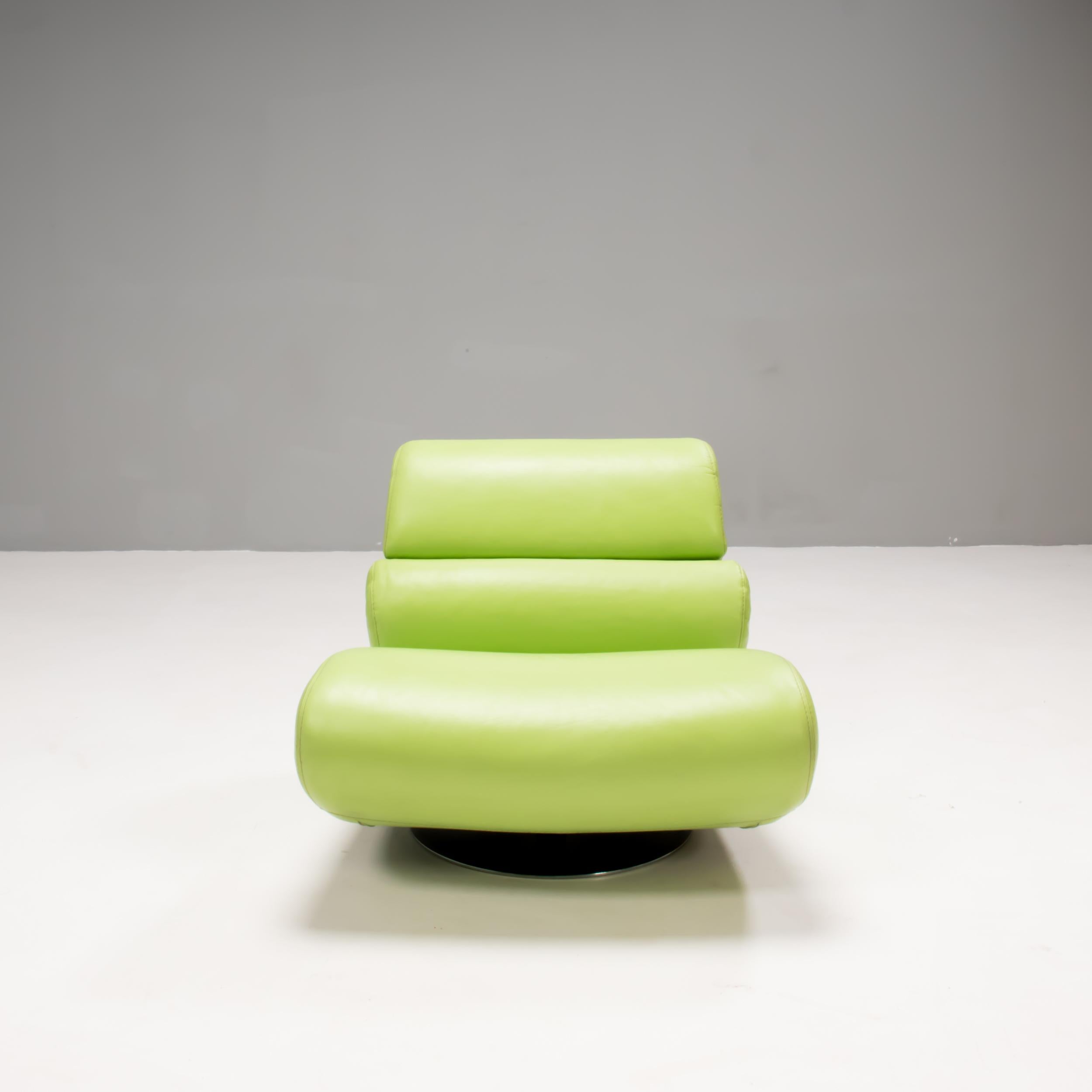 Designed by Hans Hopfer and manufactured by Roche Bobois, this lounge chair is a joyful piece of modern design.

The lounge chair is fully upholstered in vibrant lime green Tendresse leather and swivels 360 degrees on its base.

The curvaceous