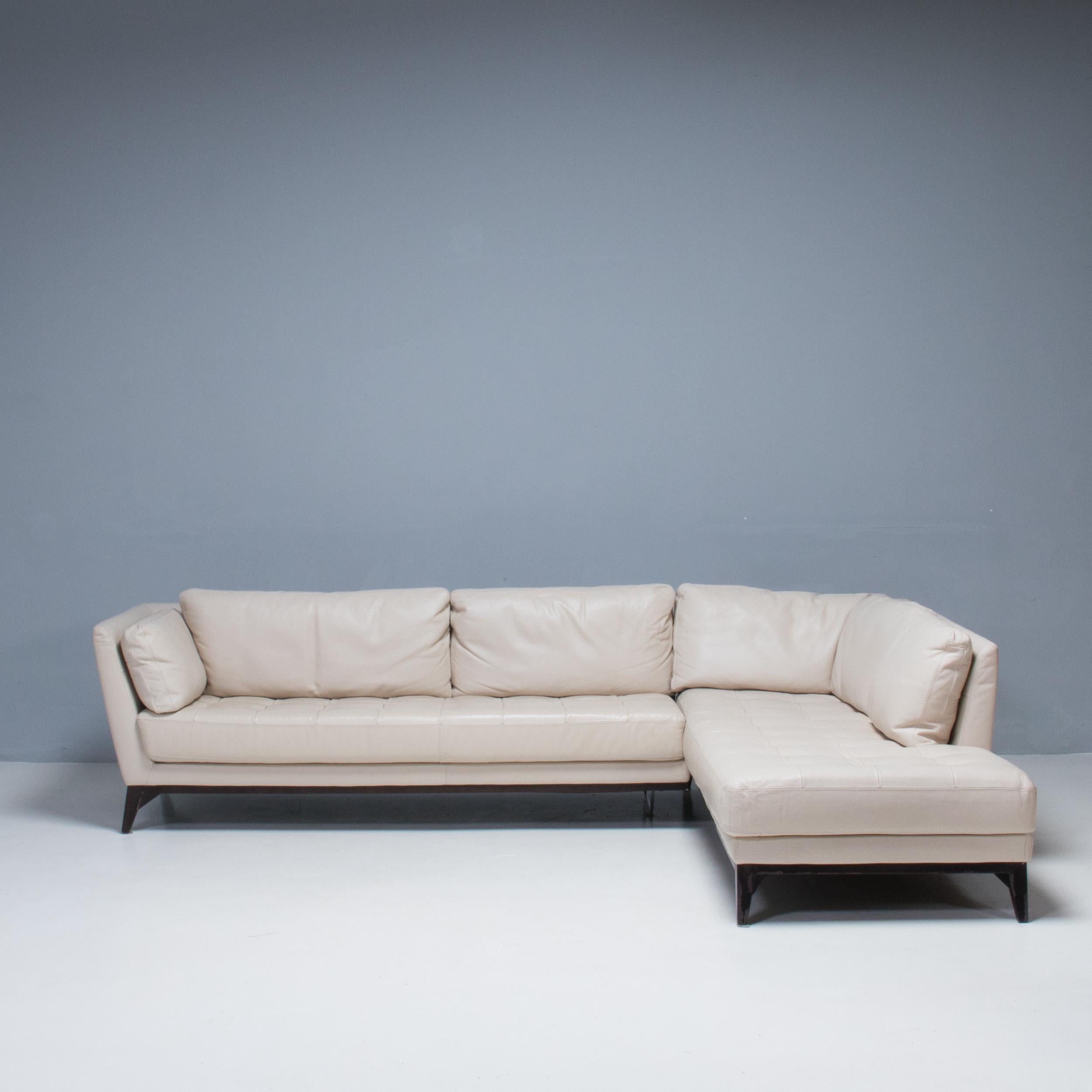 Designed by Philippe Bouix for Roche Bobois, the Perception sofa perfectly balances comfort with elegant modern design.

Constructed from a solid wood and plywood frame on a stained beech base, the sofa has a corner configuration made up of two